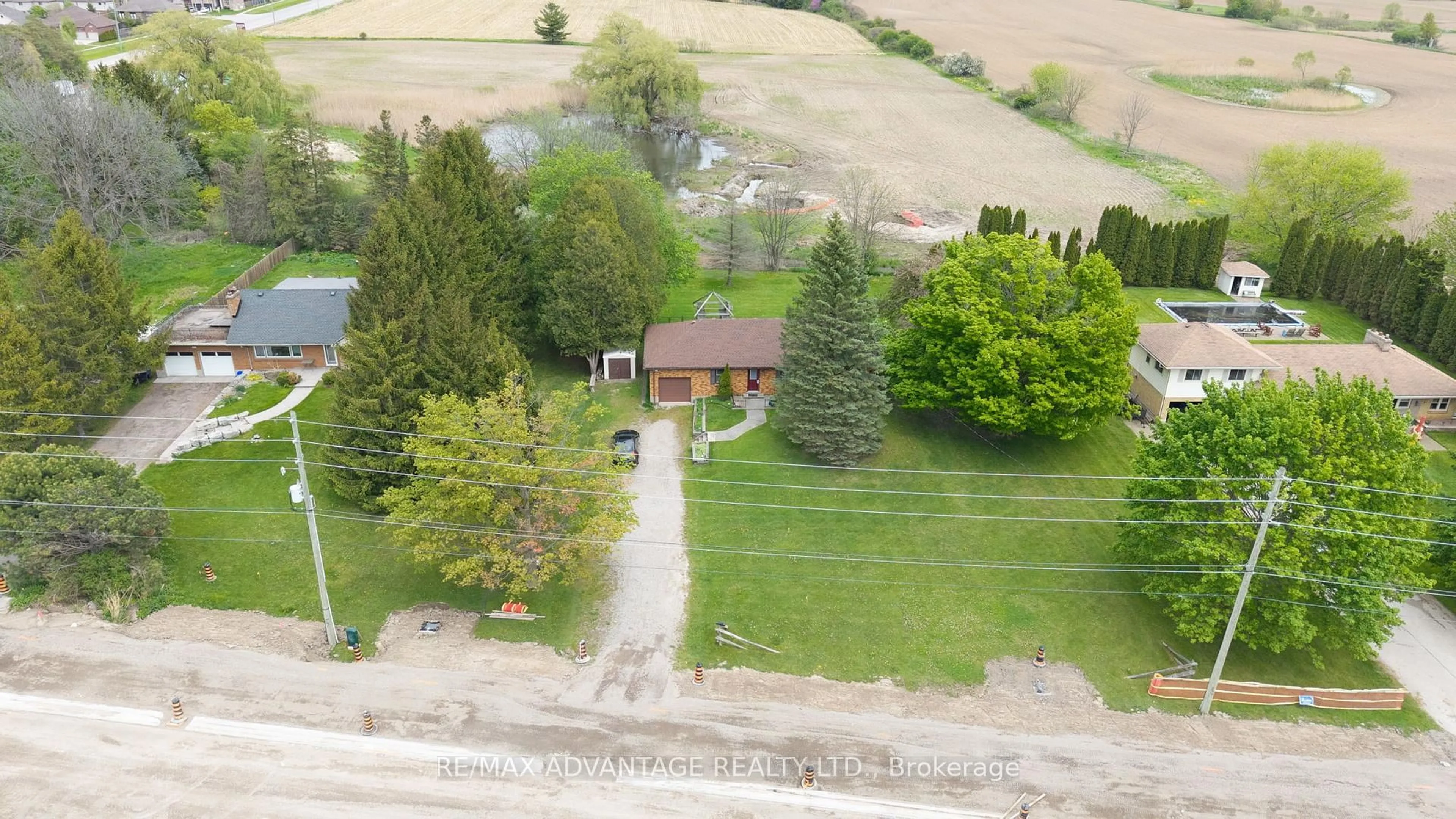 A pic from outside/outdoor area/front of a property/back of a property/a pic from drone, street for 3544 Colonel Talbot Rd, London South Ontario N6P 1H5