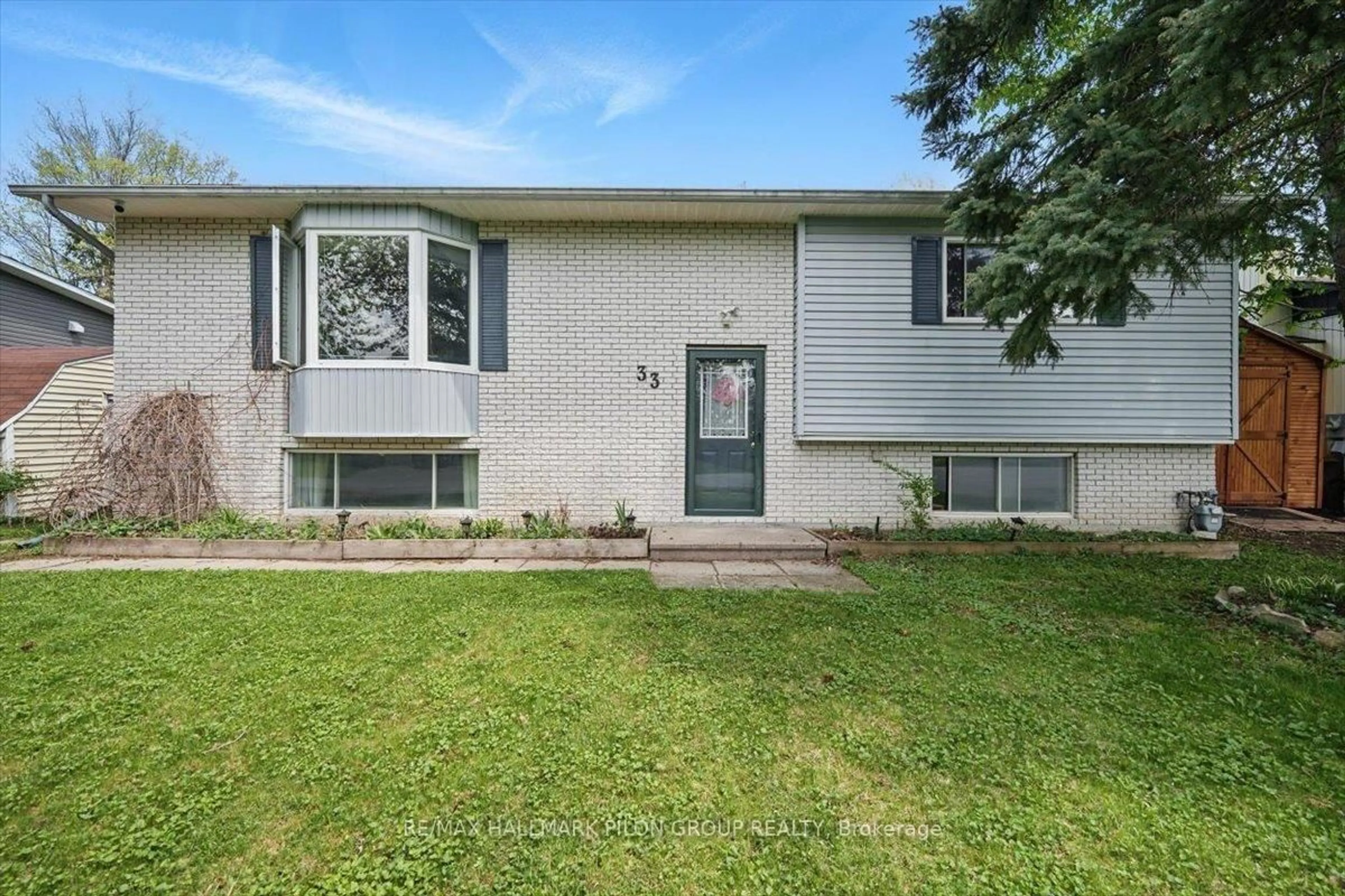 Home with vinyl exterior material, street for 33 Woodwind Cres, Ottawa Ontario K2S 1T9