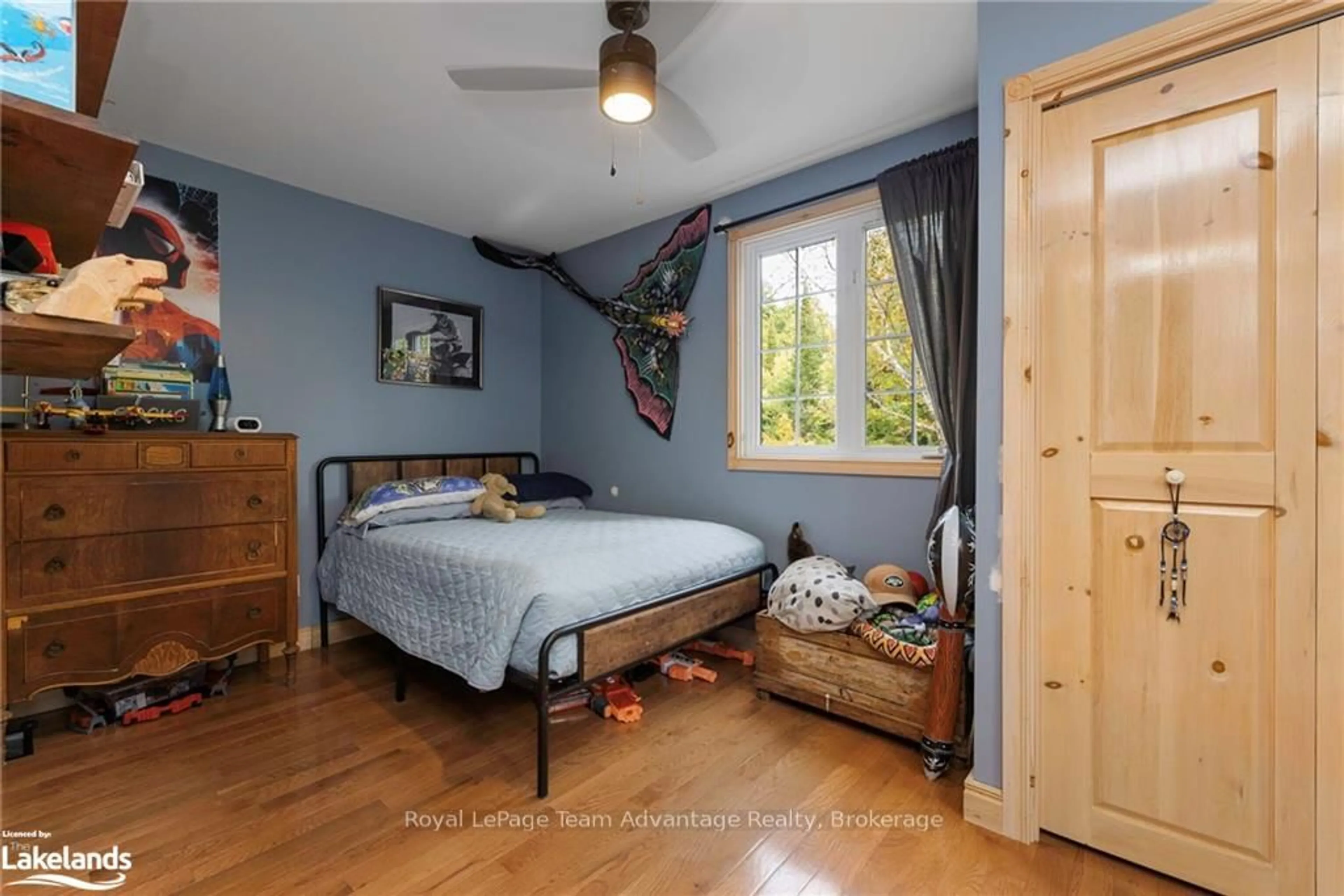 Bedroom with bed, wood/laminate floor for 3461 HWY 141 N/A, Muskoka Lakes Ontario P0B 1M0