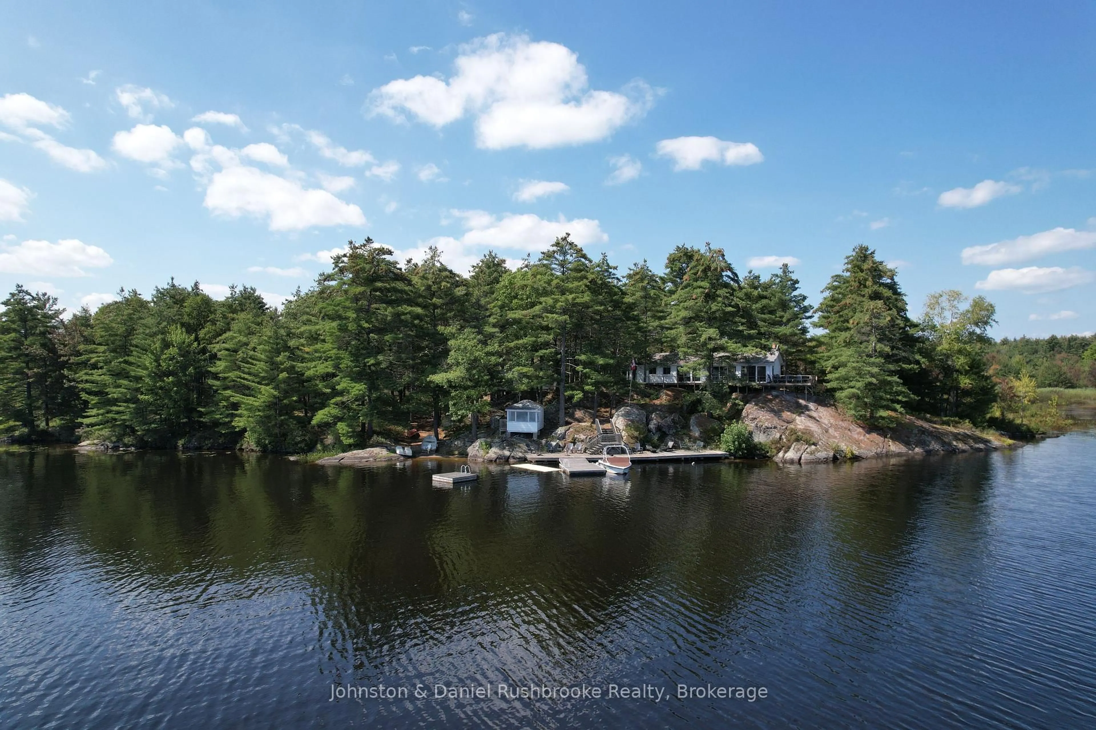 A pic from outside/outdoor area/front of a property/back of a property/a pic from drone, water/lake/river/ocean view for 1116 Tryon Dr, Gravenhurst Ontario P0E 1G0