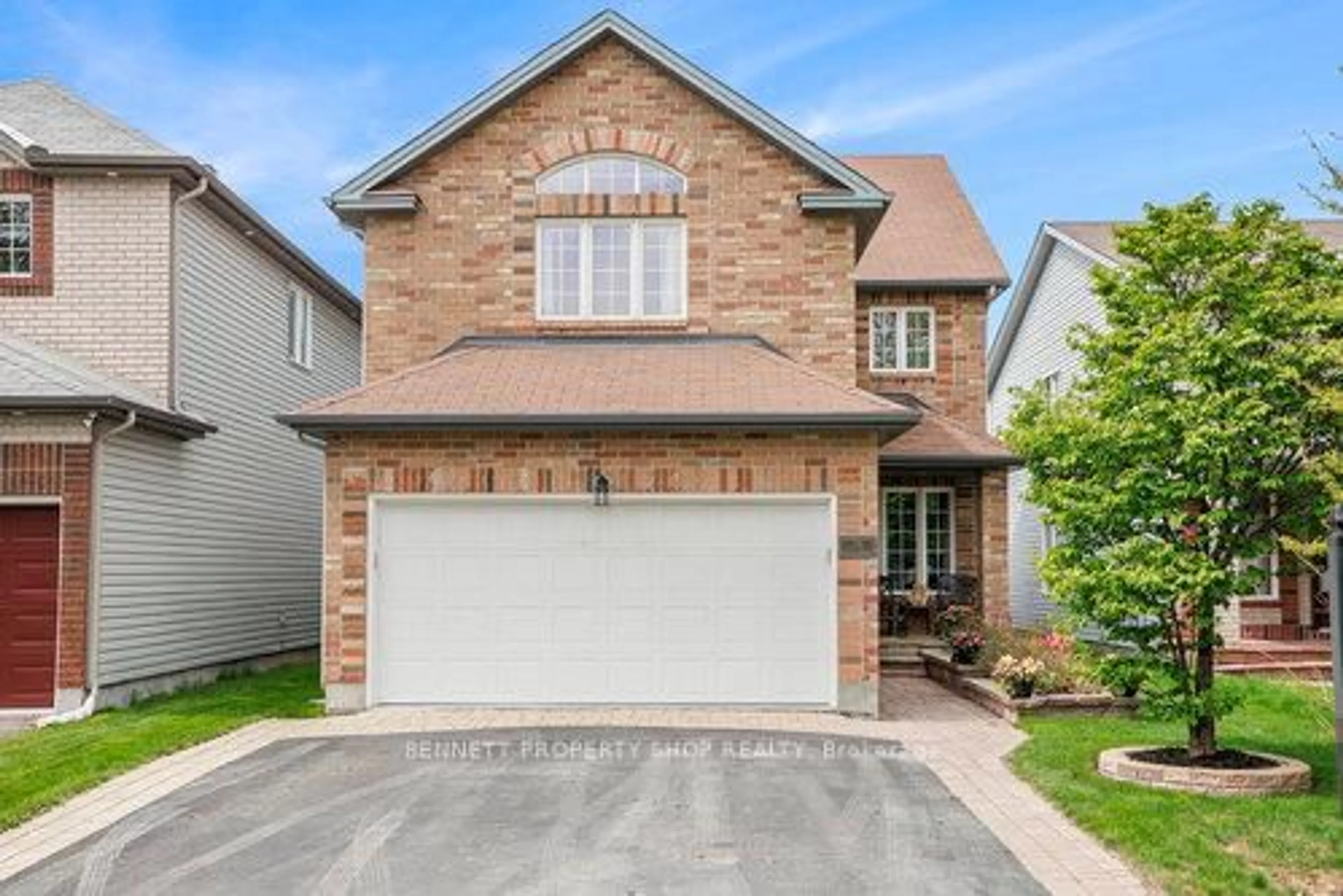 Home with brick exterior material, street for 176 Macara Cres, Kanata Ontario K2K 0C9