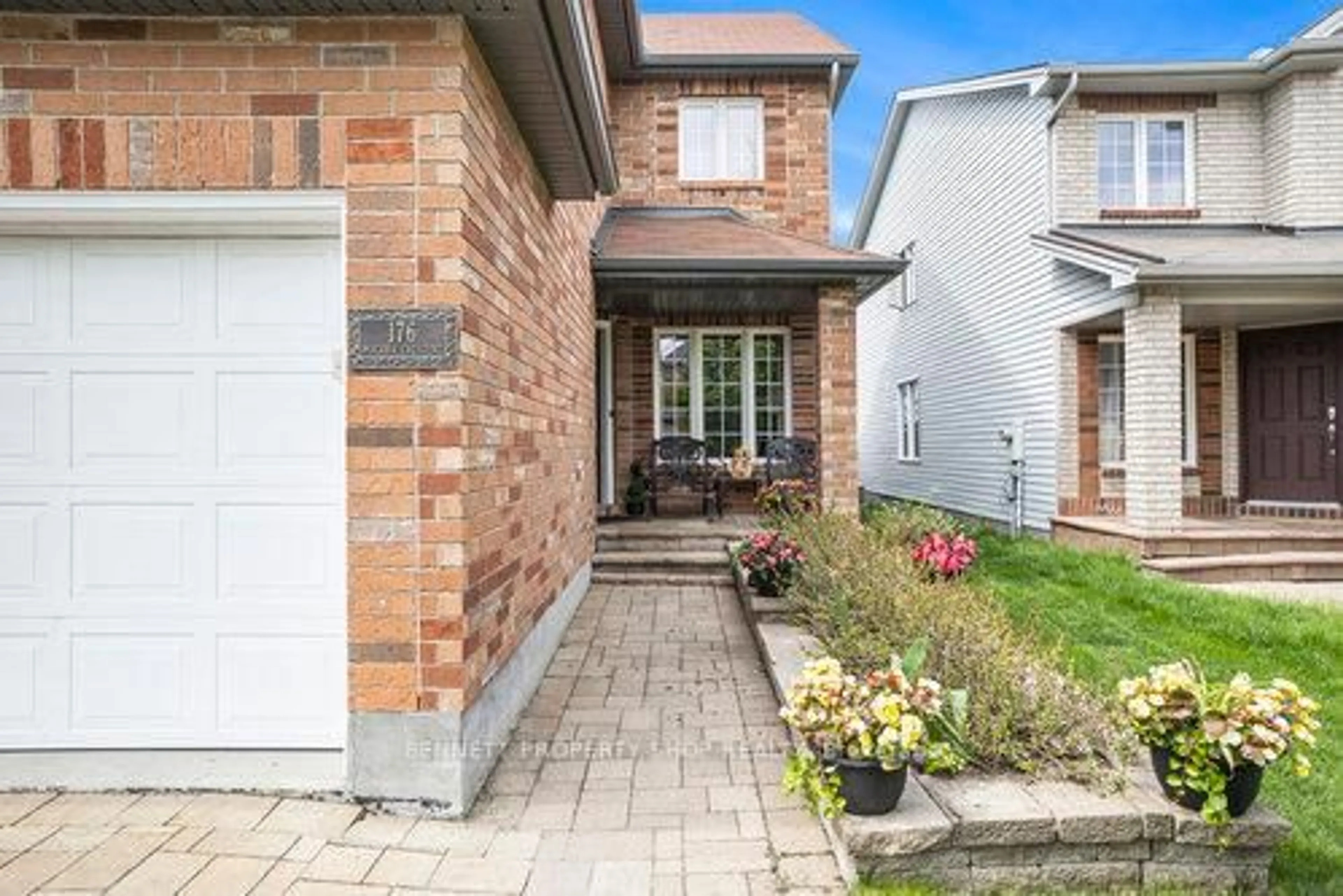 Home with brick exterior material, street for 176 Macara Cres, Kanata Ontario K2K 0C9