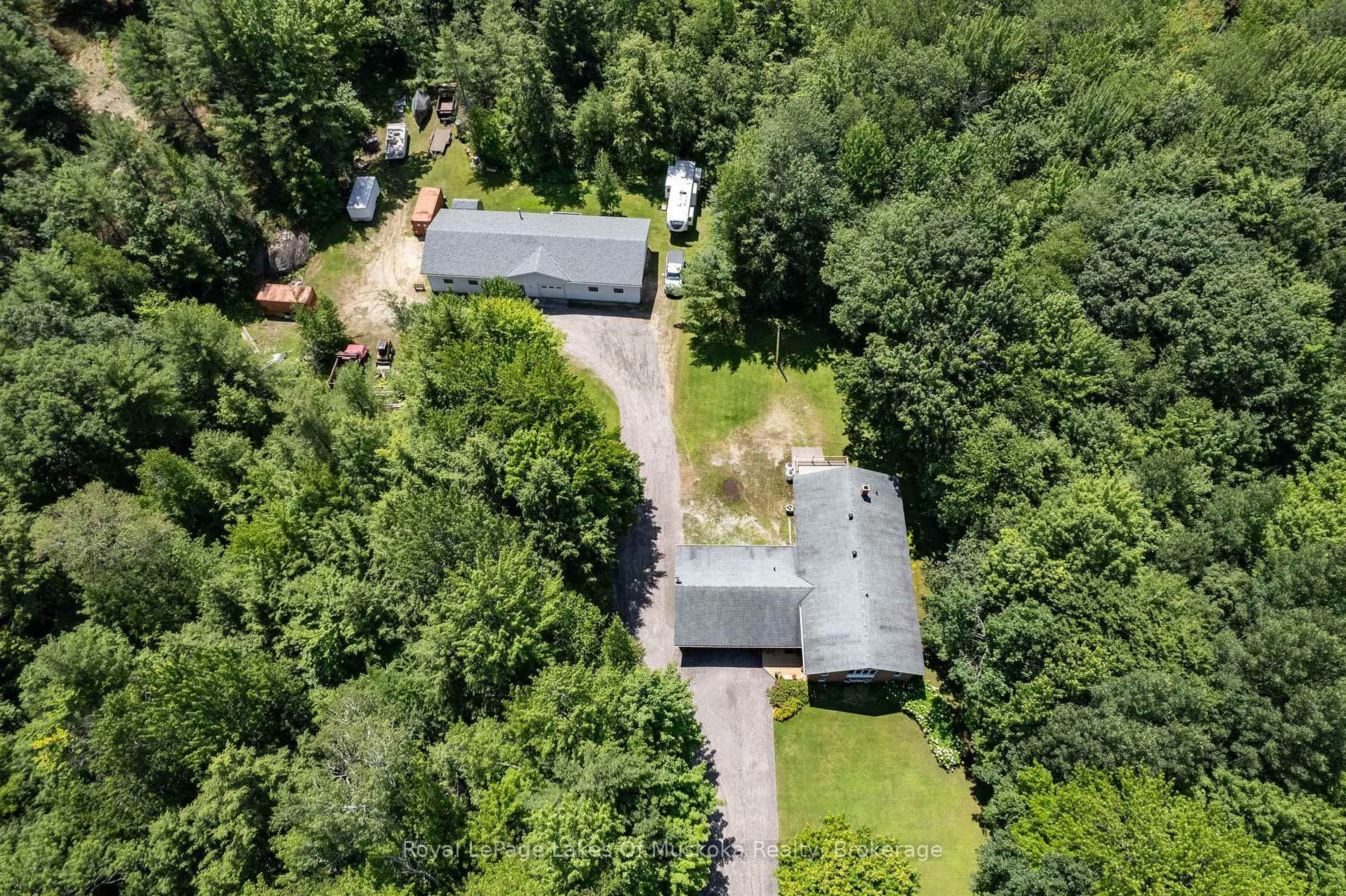 A pic from outside/outdoor area/front of a property/back of a property/a pic from drone, forest/trees view for 1020 AMELIA Cres, Gravenhurst Ontario P0E 1G0