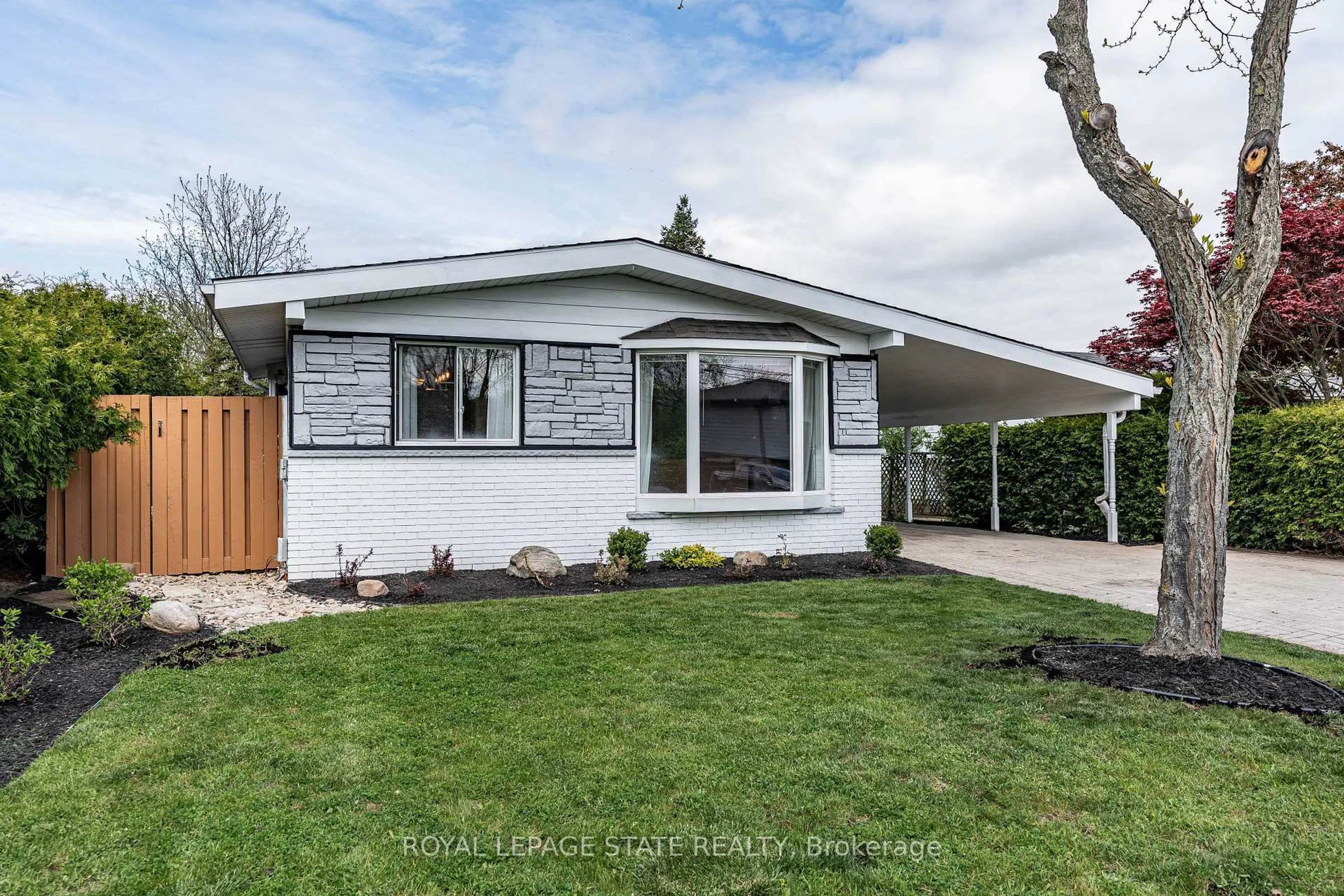 Home with vinyl exterior material, street for 14 Turnbull Rd, Hamilton Ontario L9H 3W3