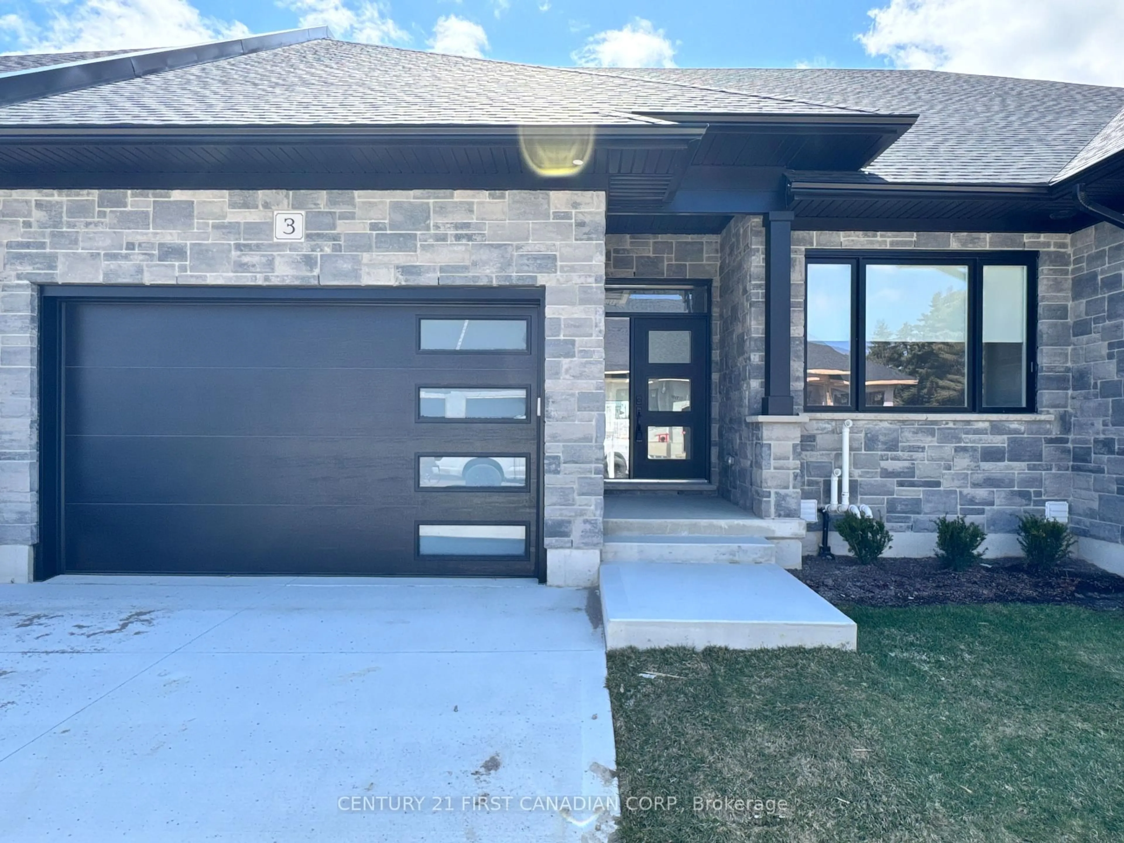 Home with brick exterior material, street for 32 Postma Cres #7, North Middlesex Ontario N0M 1A0