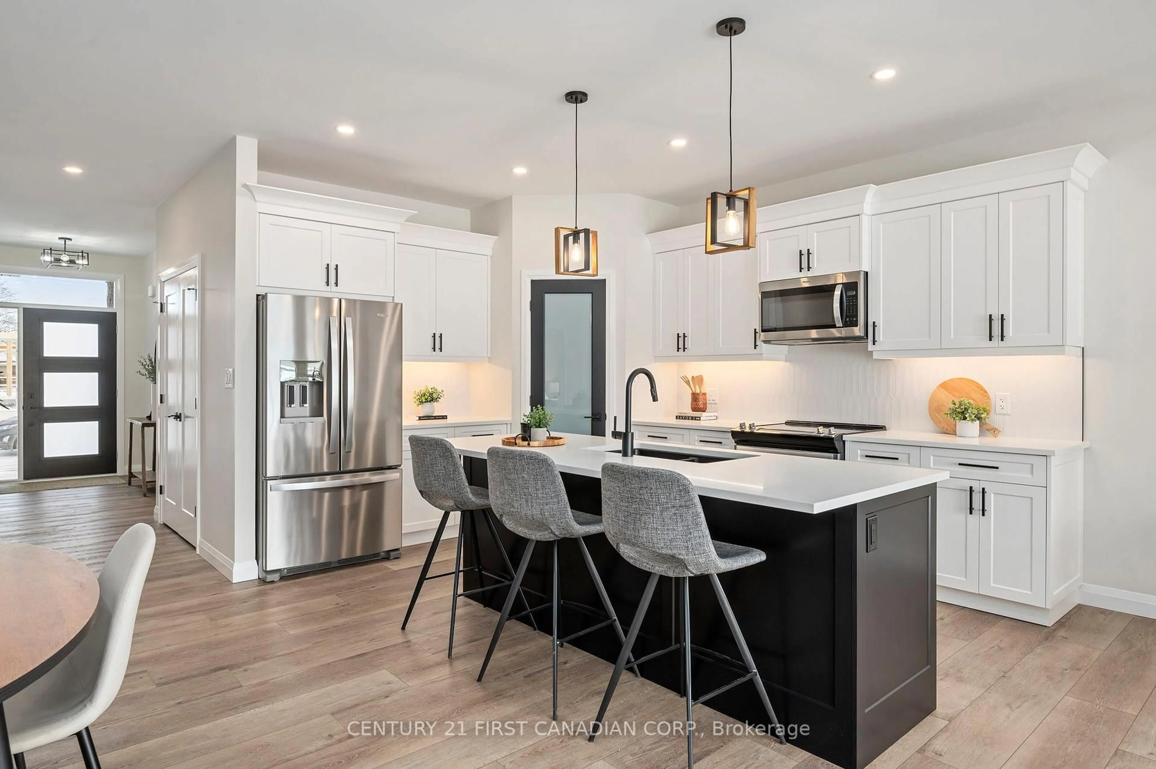 Open concept kitchen, unknown for 32 Postma Cres #7, North Middlesex Ontario N0M 1A0
