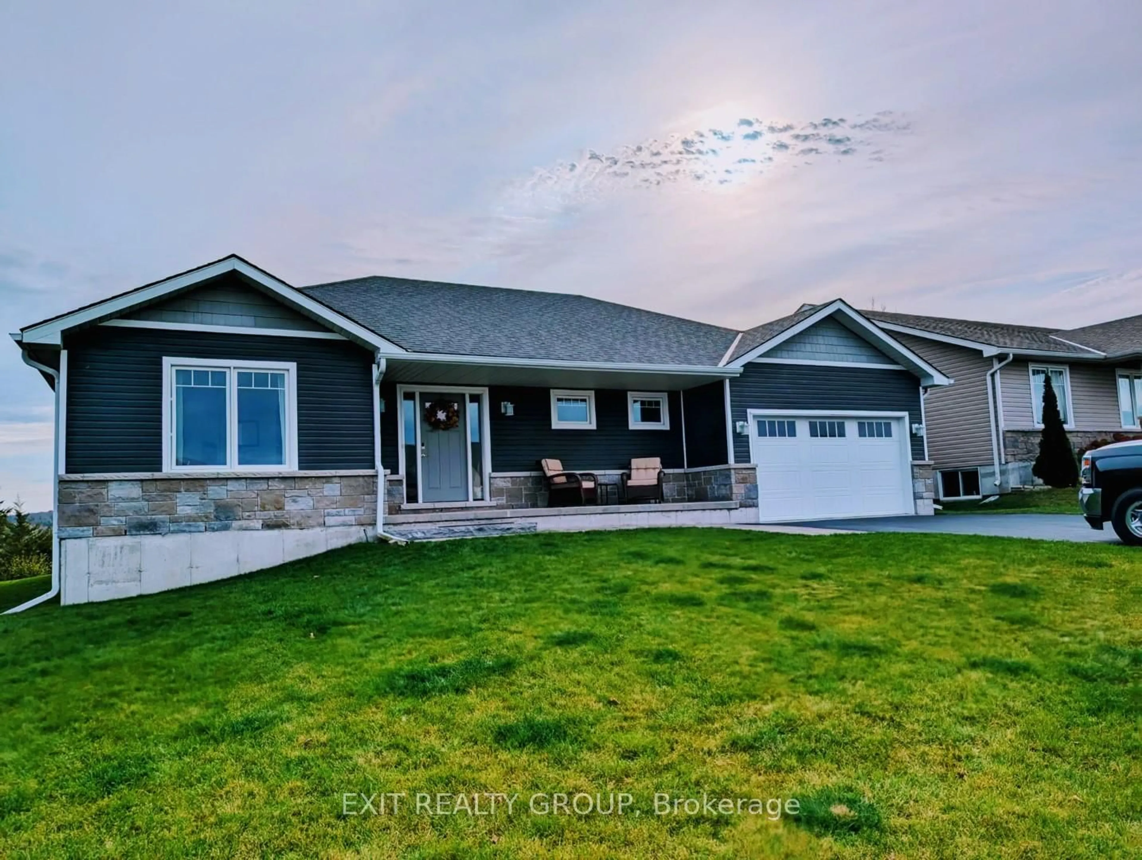 Home with vinyl exterior material, street for 25 Meagan Lane, Hastings Ontario K0K 2C0