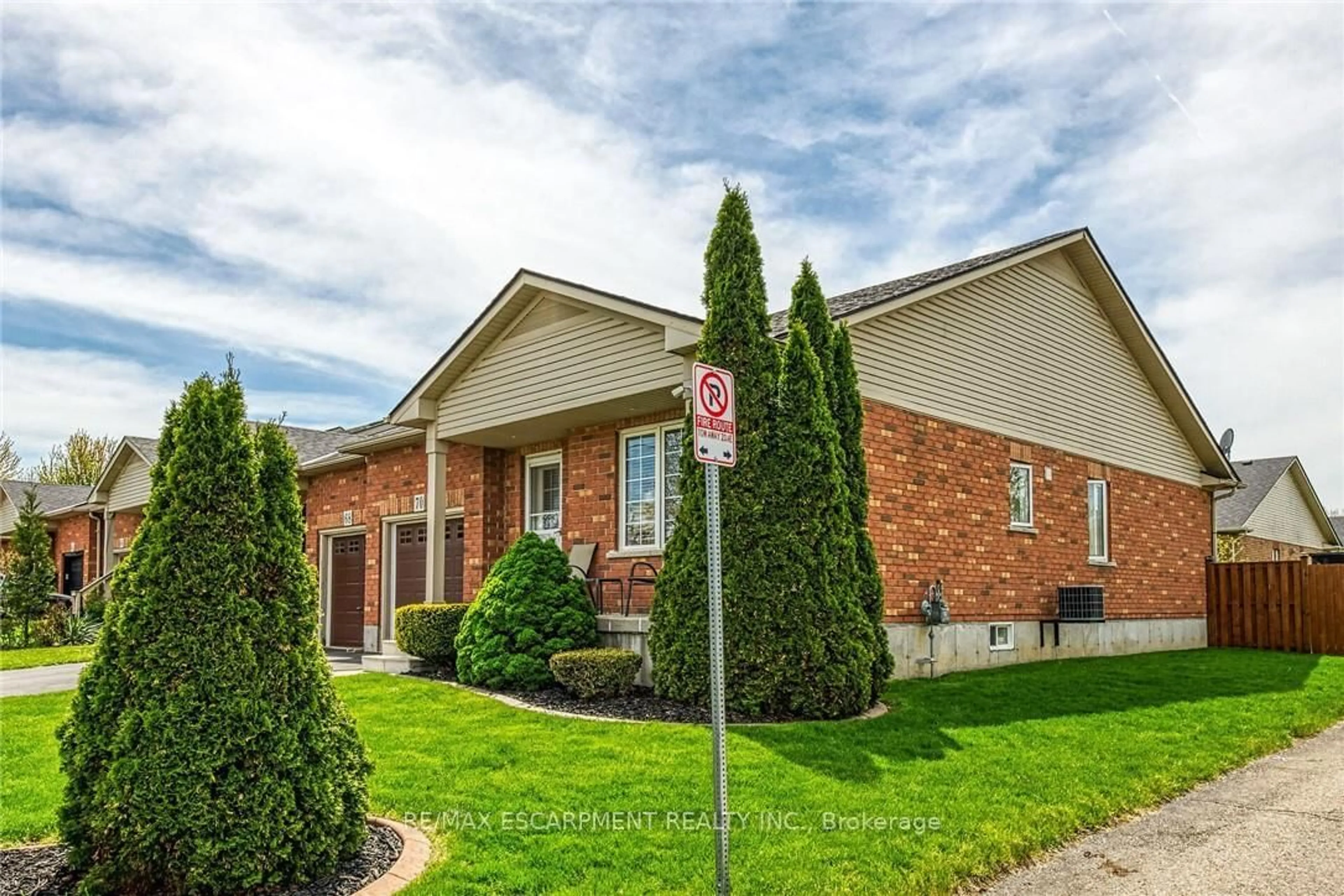 Home with brick exterior material, street for 70 Garden Ave, Brantford Ontario N3S 0A1