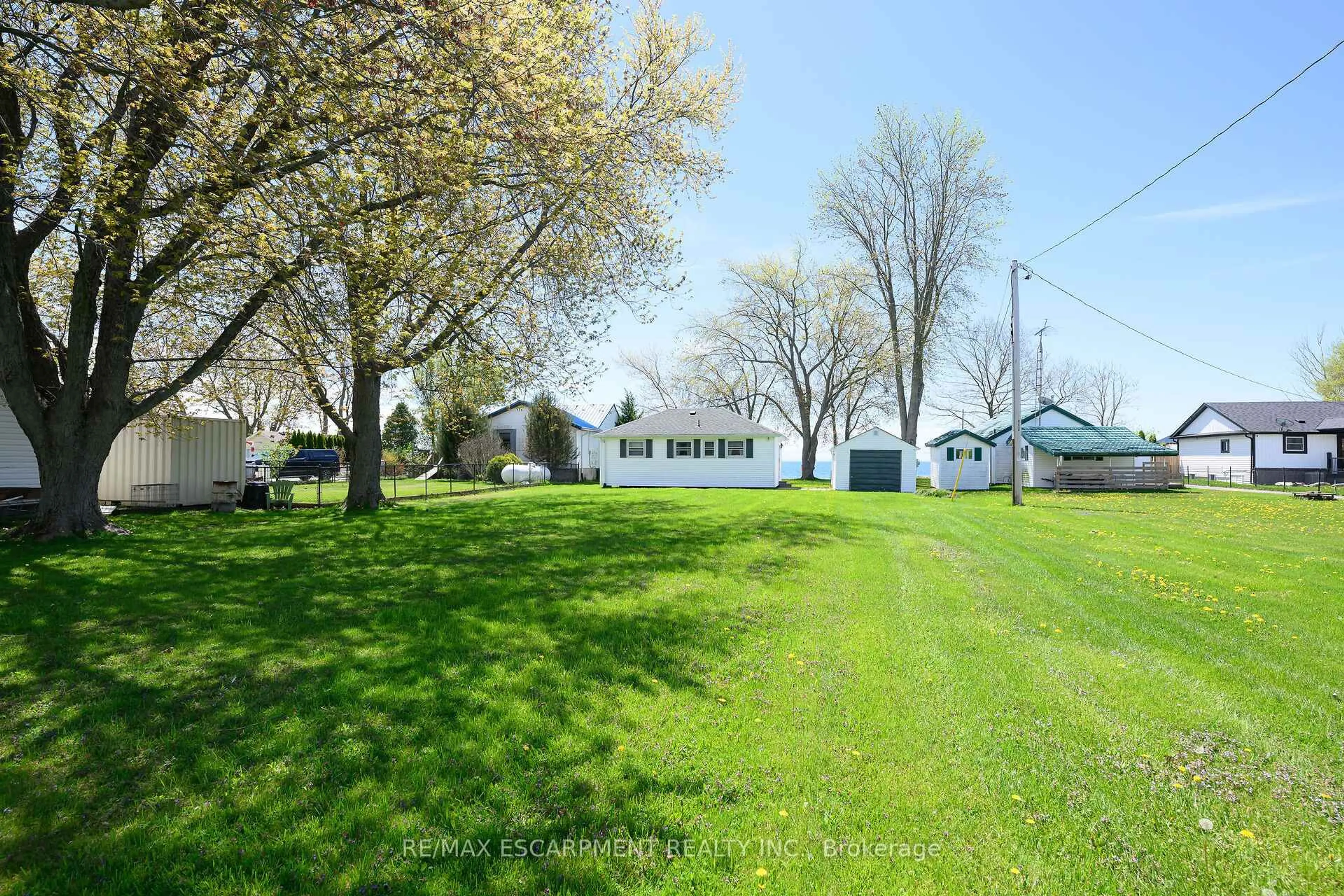A pic from outside/outdoor area/front of a property/back of a property/a pic from drone, street for 13 Horseshoe Bay Rd, Haldimand Ontario N1A 2W8