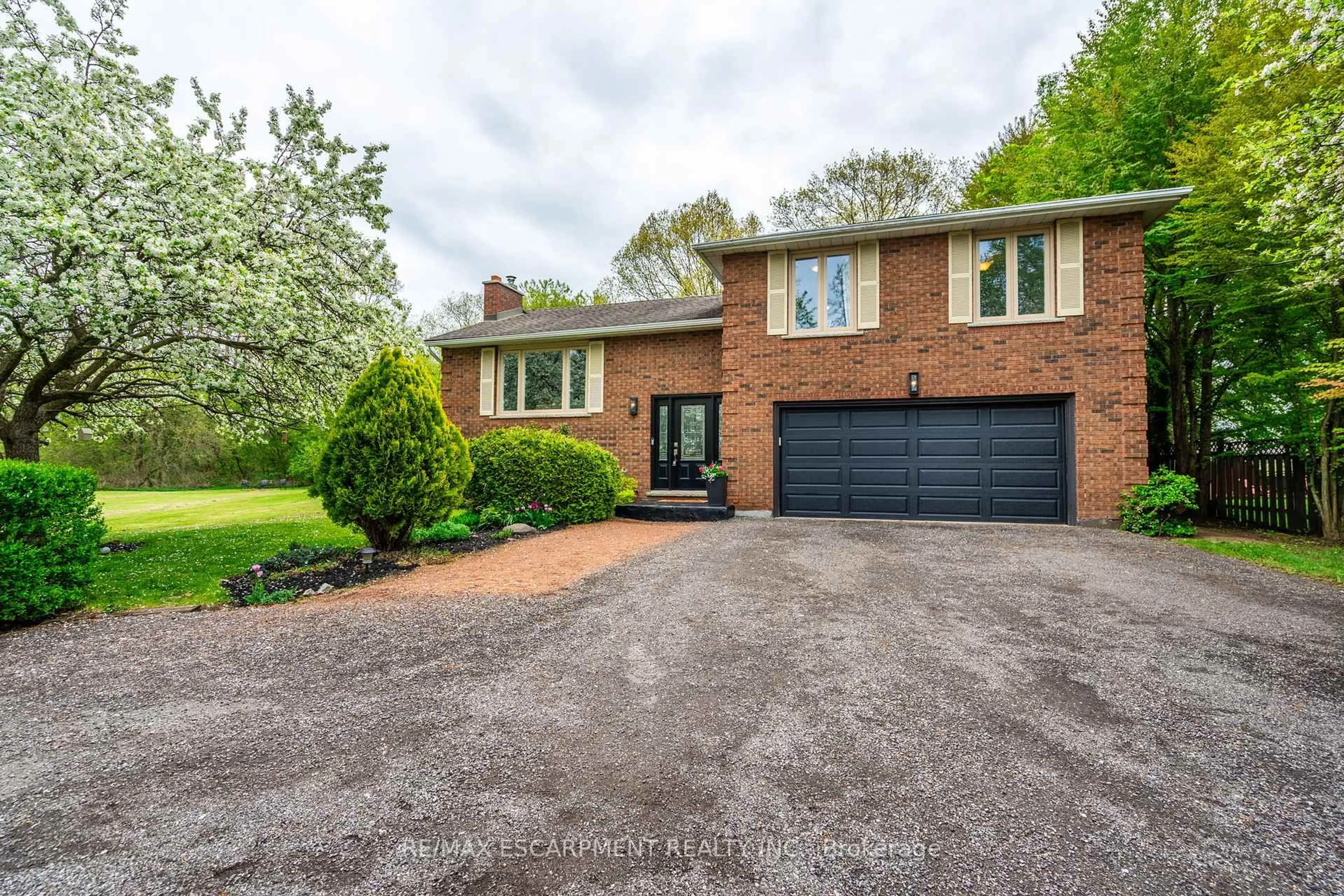 Home with brick exterior material, street for 152 Concession 7 Rd, Hamilton Ontario L0R 1V0