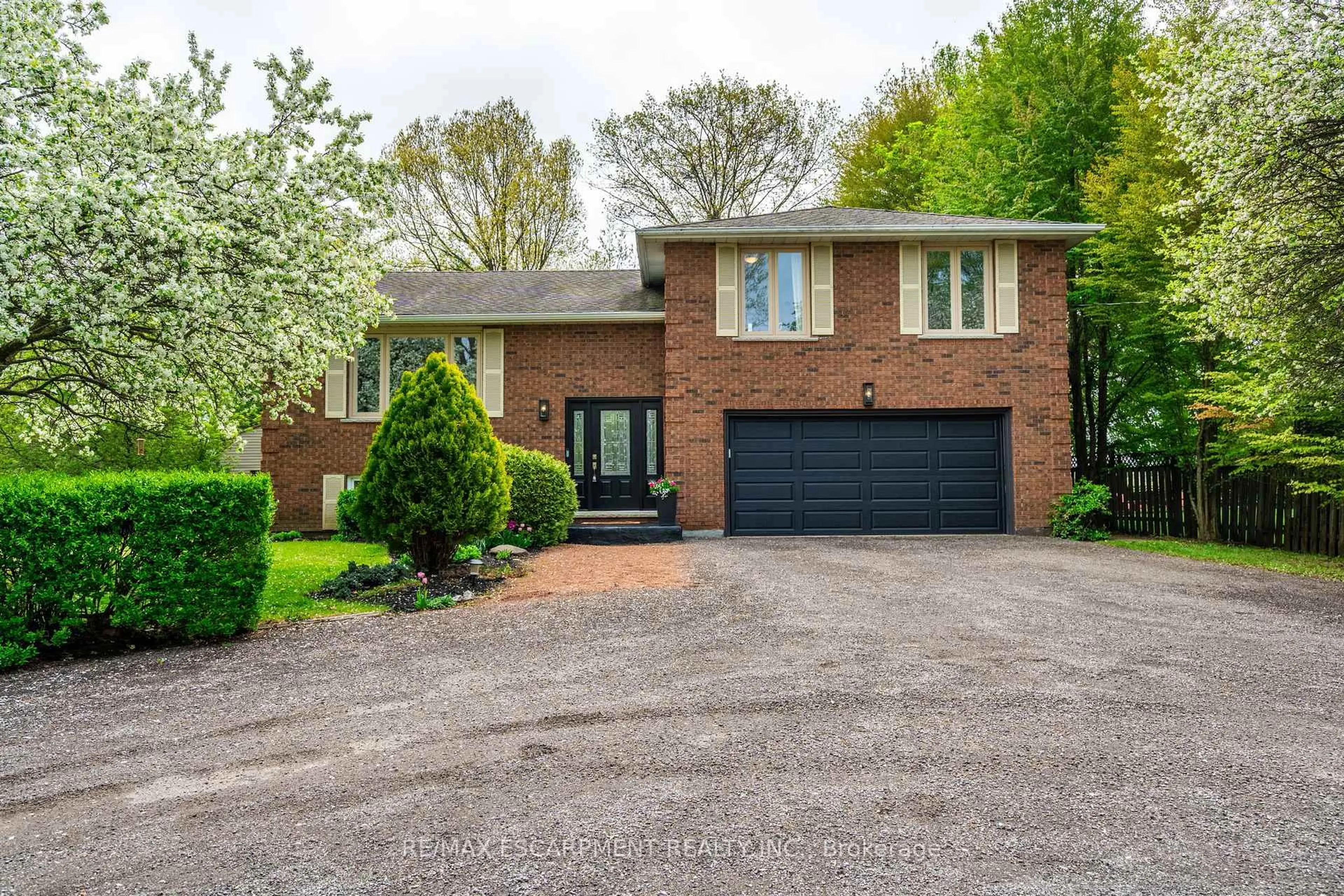 Home with brick exterior material, street for 152 Concession 7 Rd, Hamilton Ontario L0R 1V0