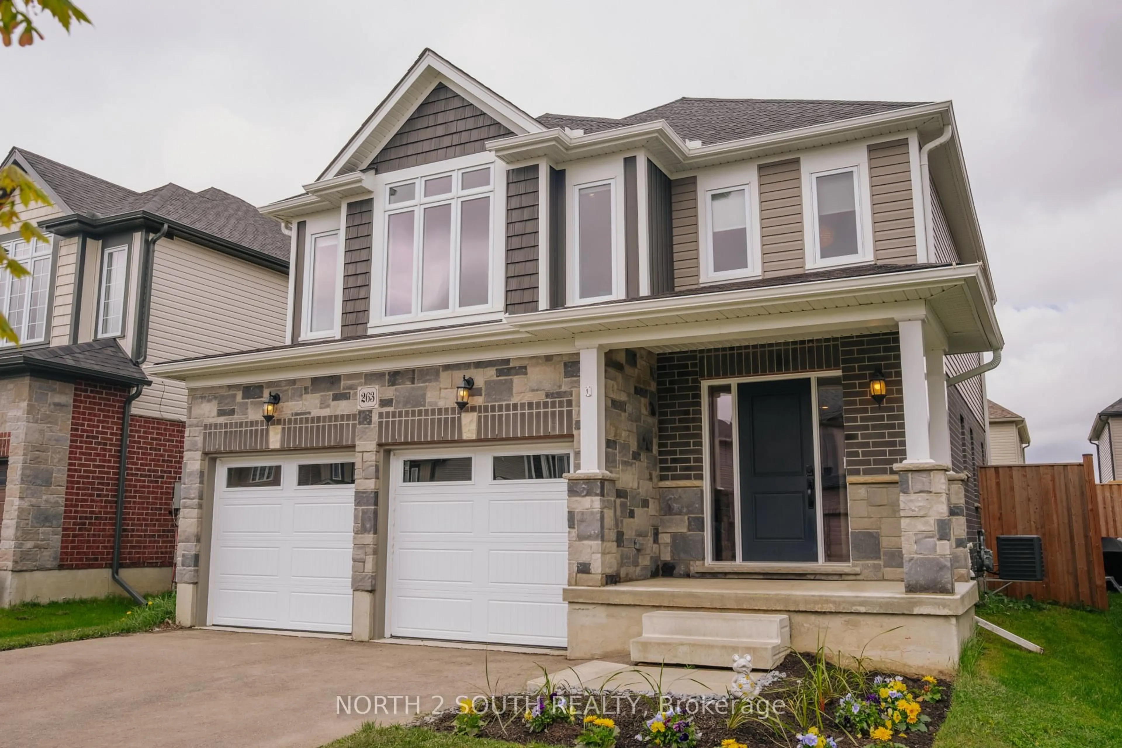 Home with brick exterior material, street for 263 Bradshaw Dr, Stratford Ontario N5A 0G5