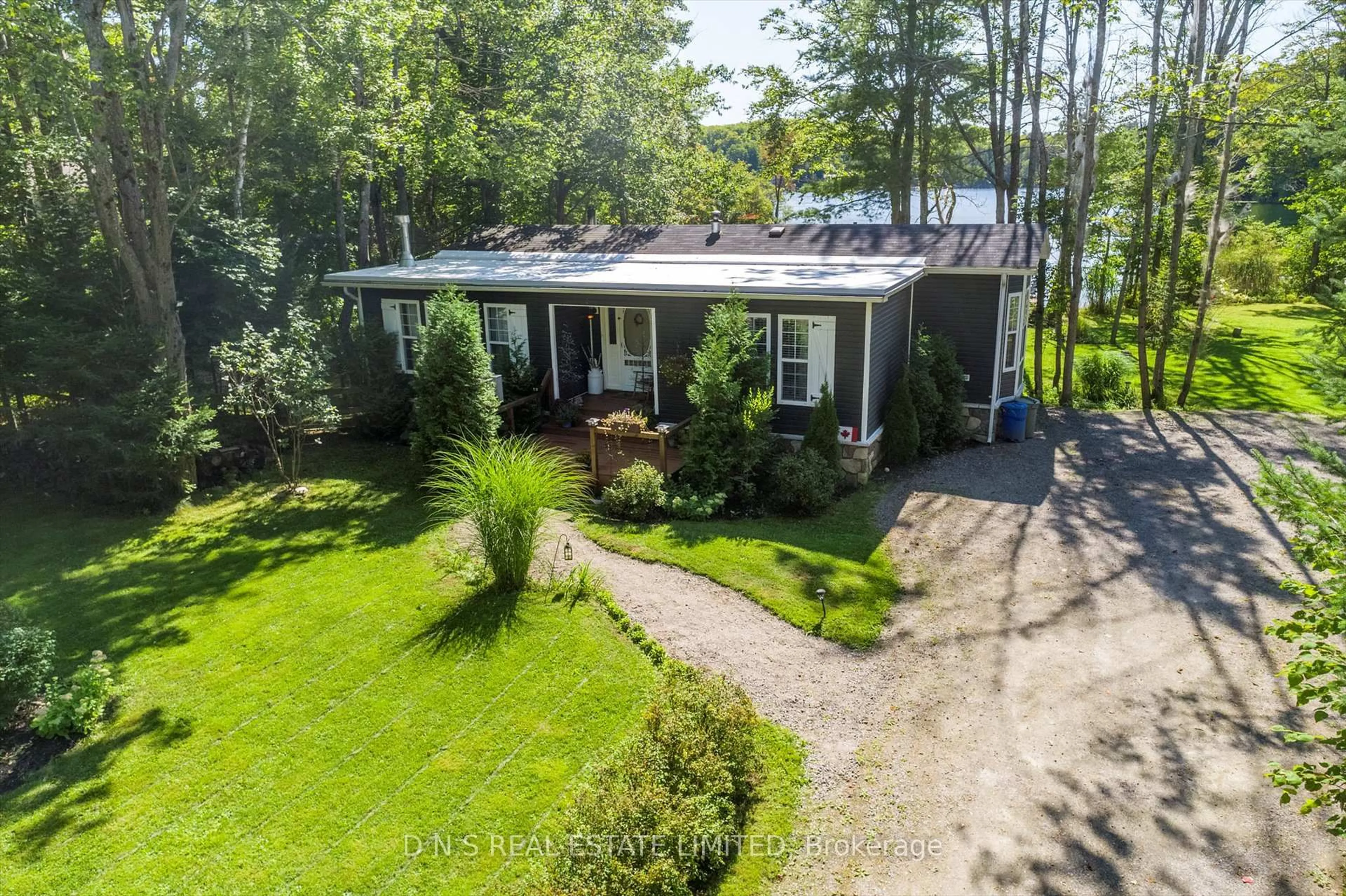 A pic from outside/outdoor area/front of a property/back of a property/a pic from drone, forest/trees view for 14 Robinson Lane, Bancroft Ontario K0L 2L0