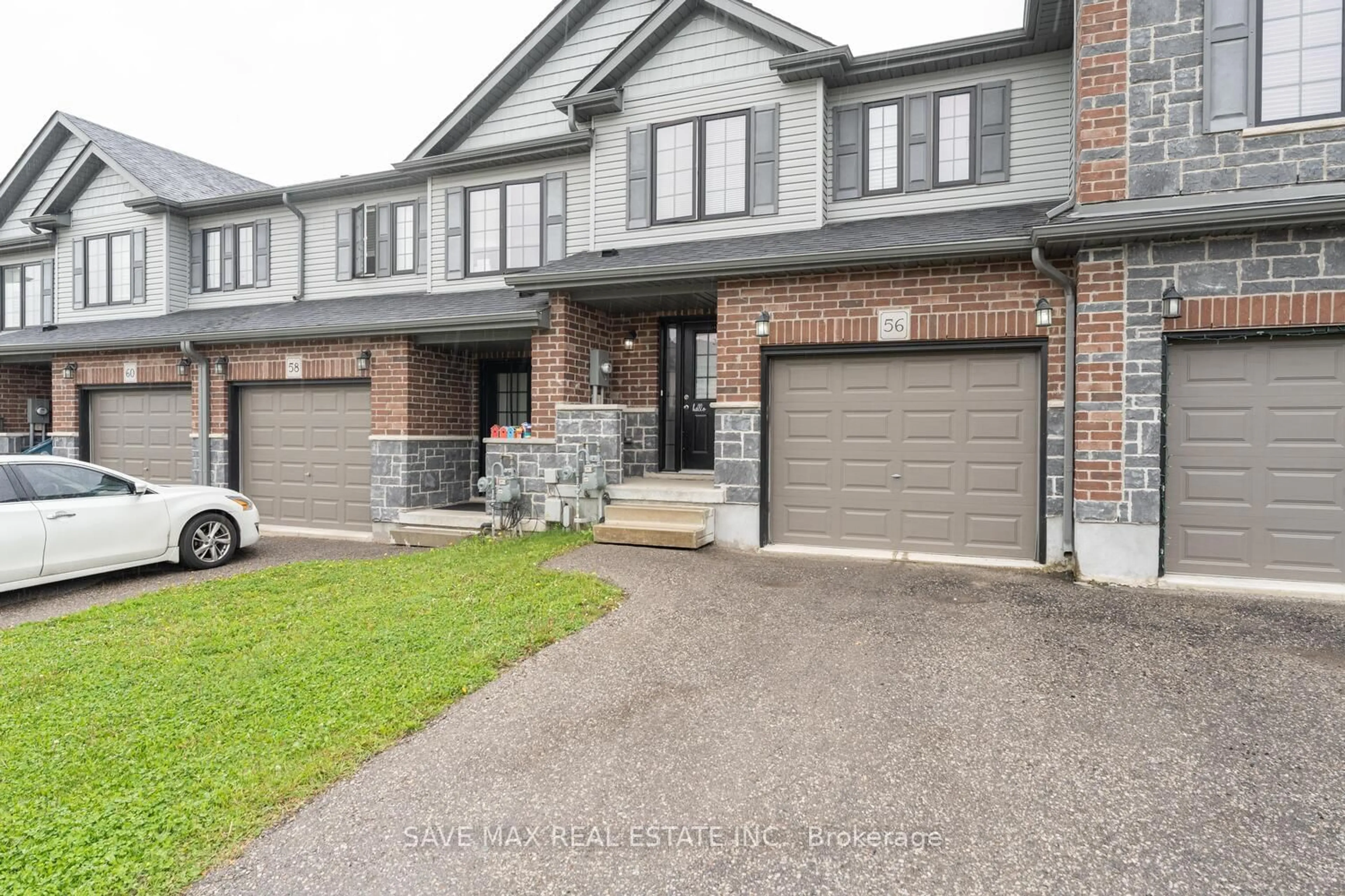 Home with brick exterior material, street for 56 Honey St, Cambridge Ontario N1T 2C9