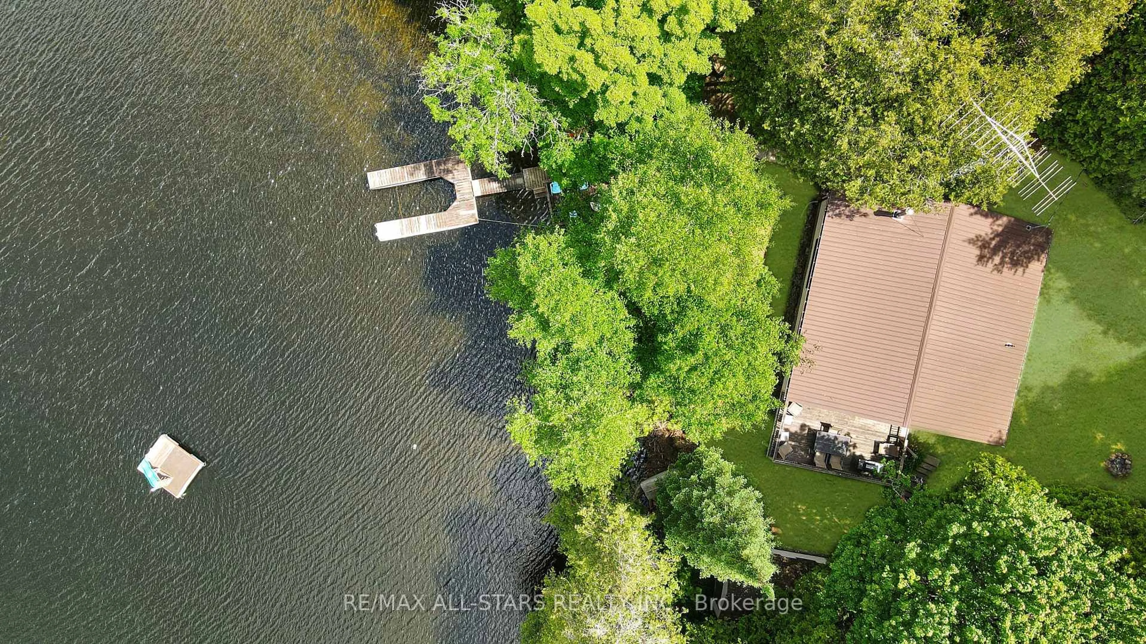 A pic from outside/outdoor area/front of a property/back of a property/a pic from drone, water/lake/river/ocean view for 1233 Crystal Lake Rd, Trent Lakes Ontario K0M 2A0