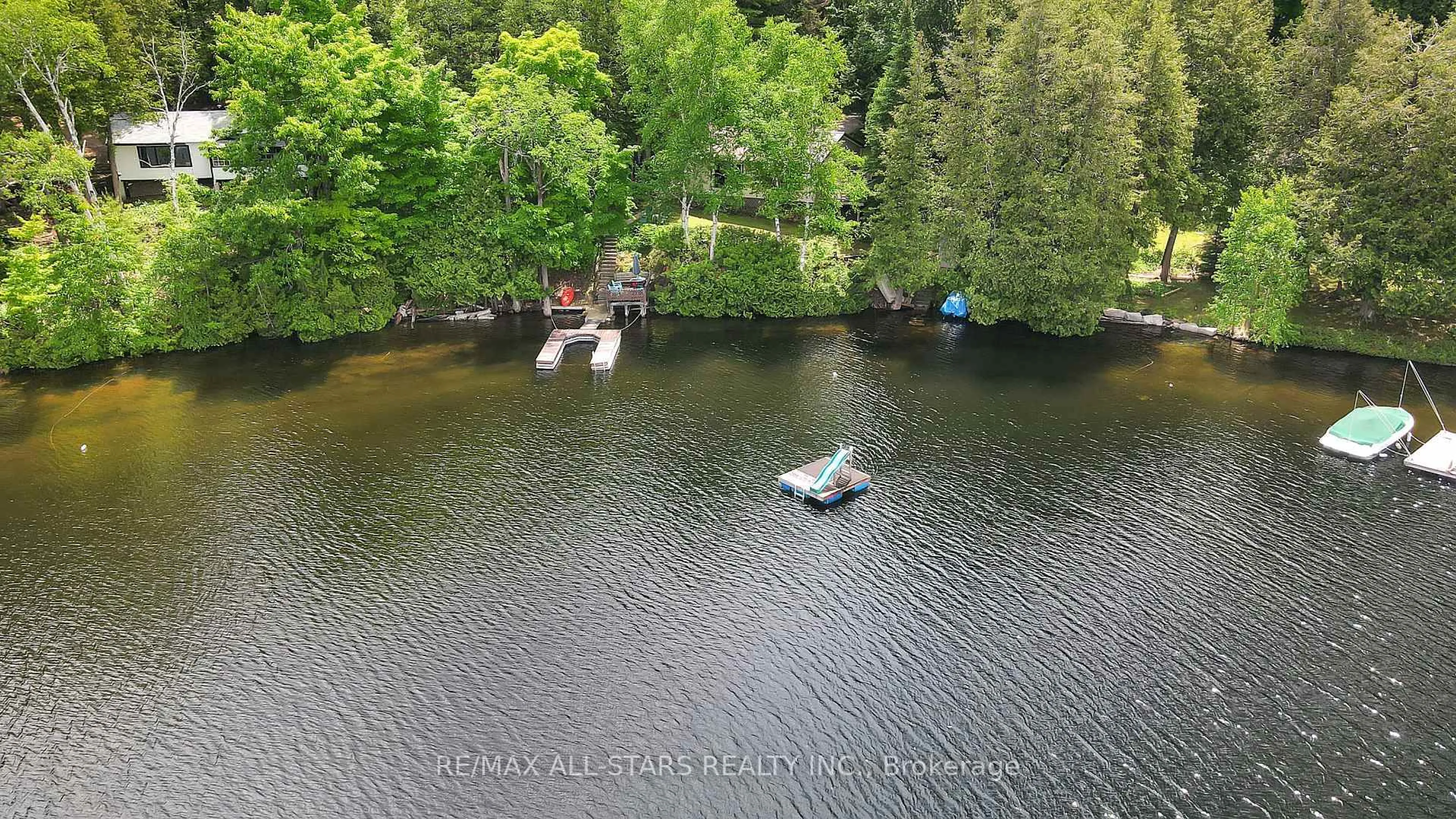 A pic from outside/outdoor area/front of a property/back of a property/a pic from drone, water/lake/river/ocean view for 1233 Crystal Lake Rd, Trent Lakes Ontario K0M 2A0