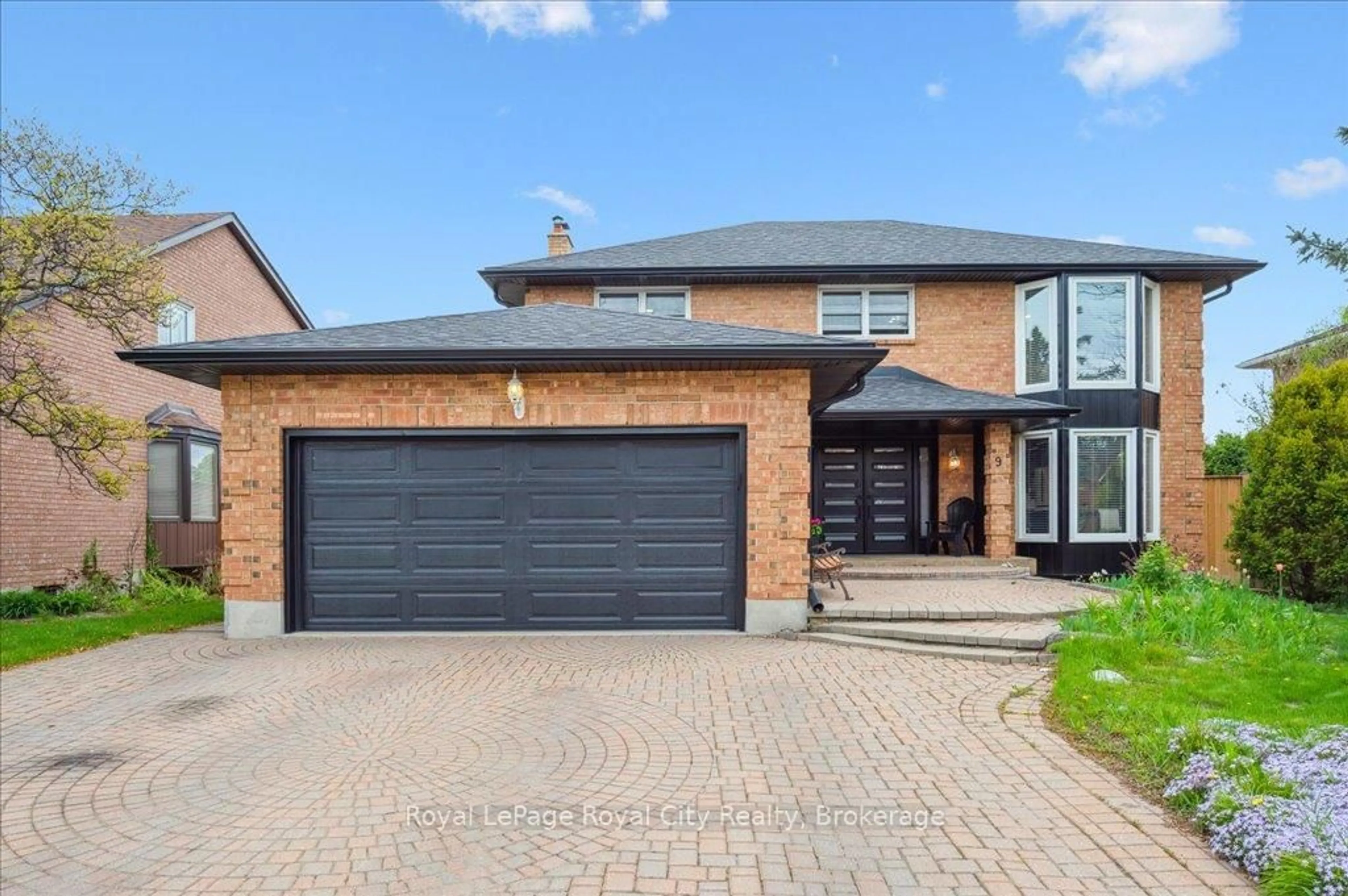 Home with brick exterior material, street for 9 Kortright Rd, Guelph Ontario N1G 4C8
