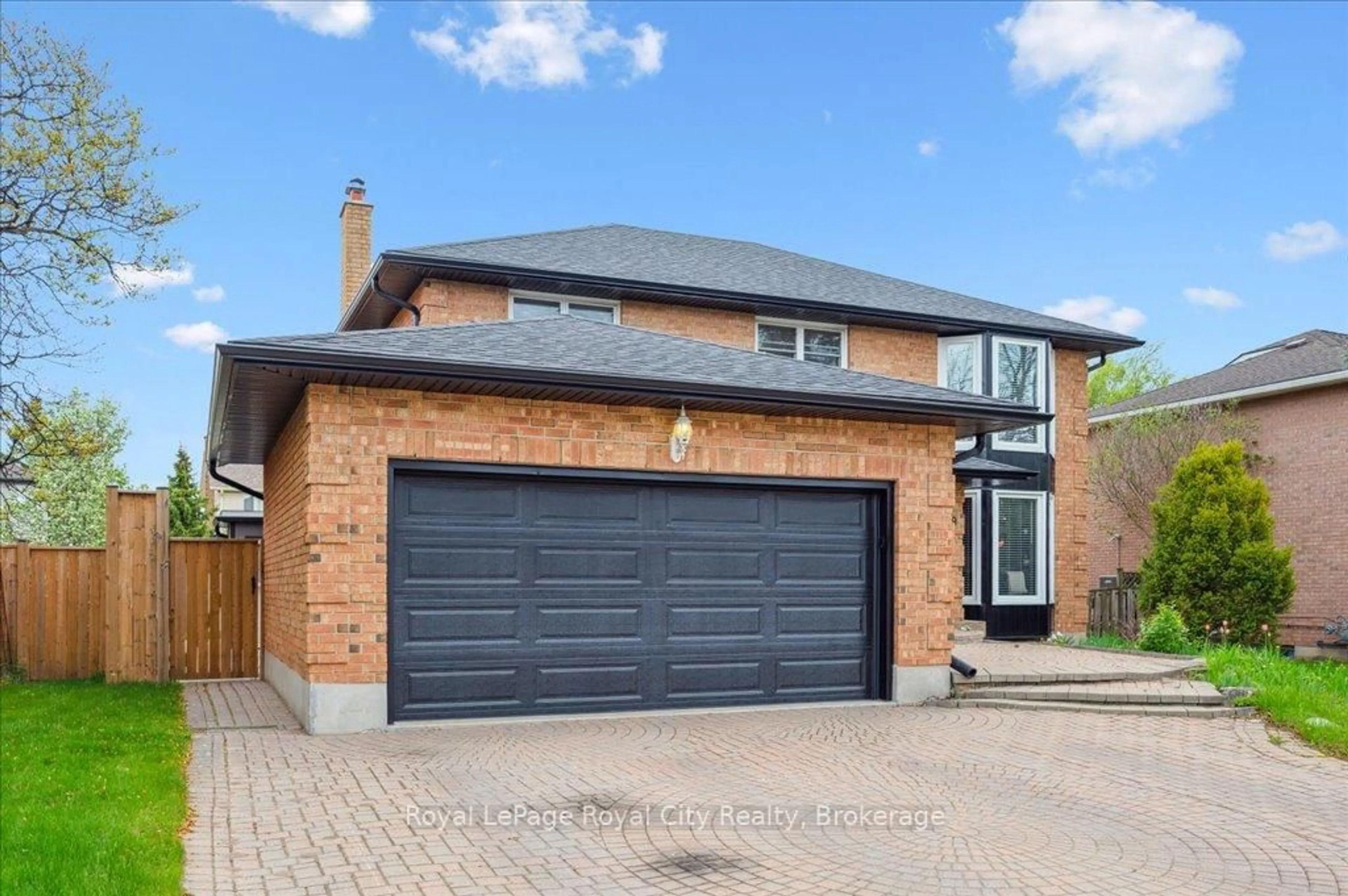 Home with brick exterior material, street for 9 Kortright Rd, Guelph Ontario N1G 4C8