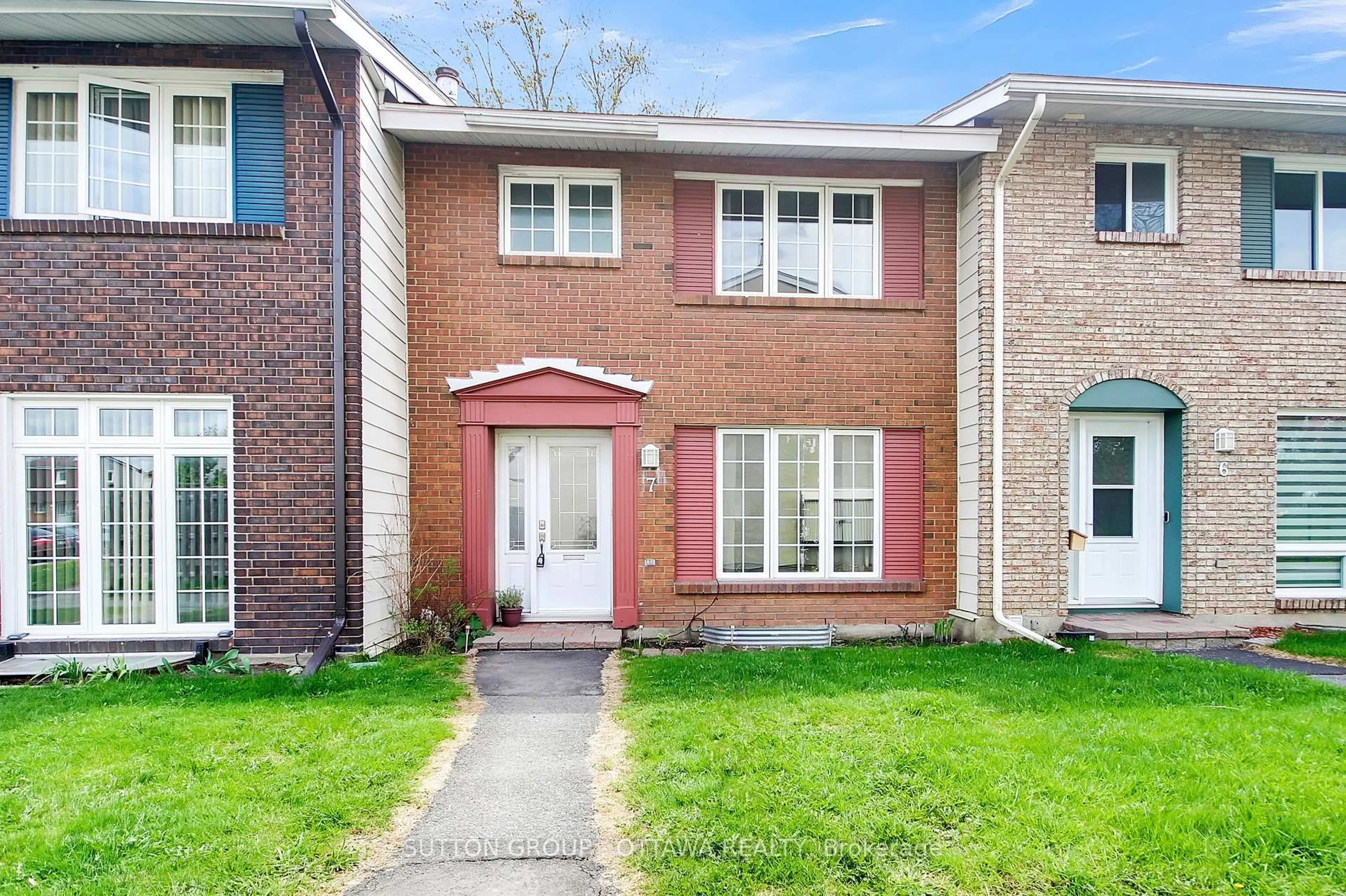 Home with brick exterior material, street for 2051 Jasmine Cres #7, Ottawa Ontario K1J 7W2