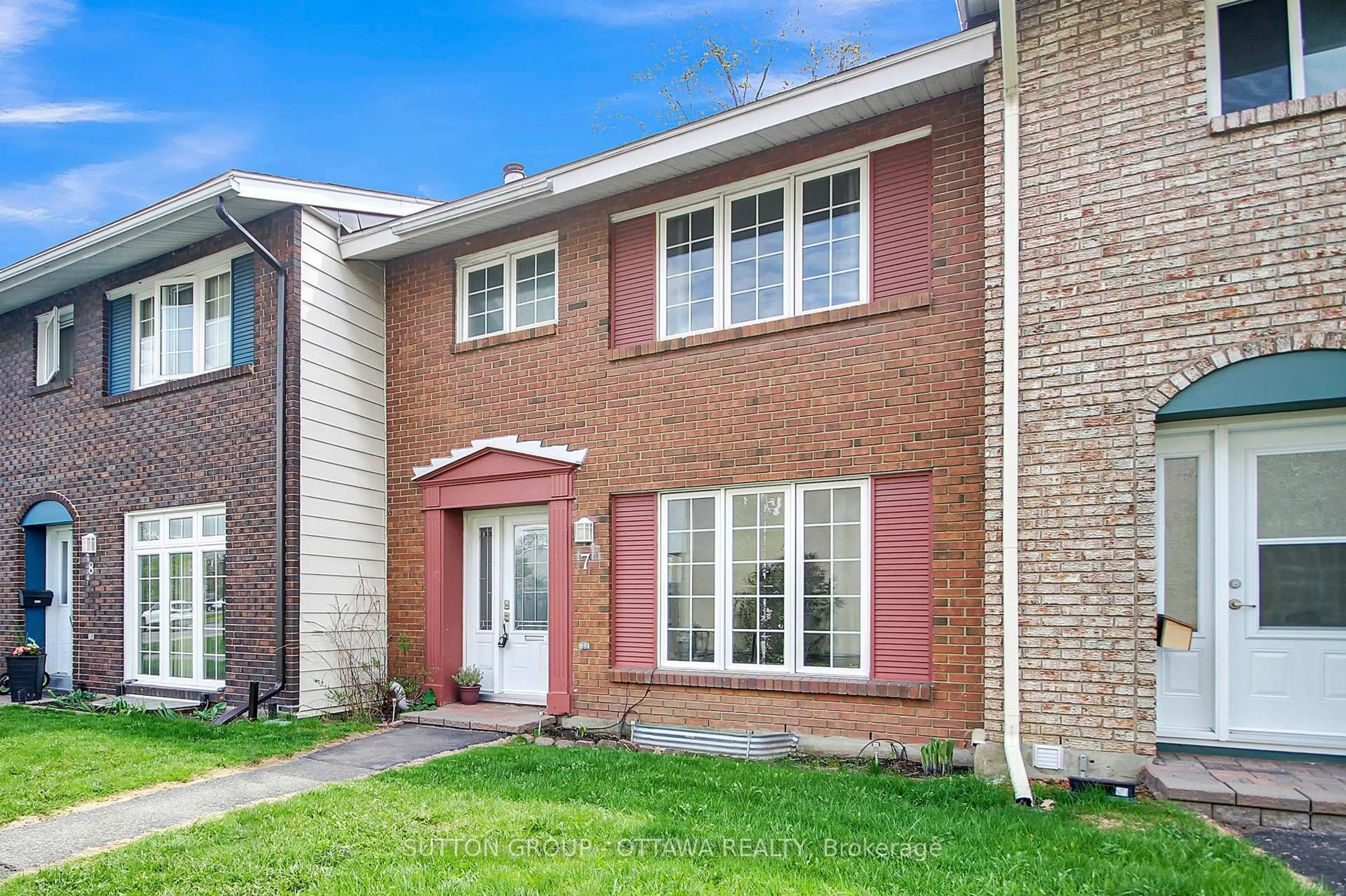 Home with brick exterior material, street for 2051 Jasmine Cres #7, Ottawa Ontario K1J 7W2