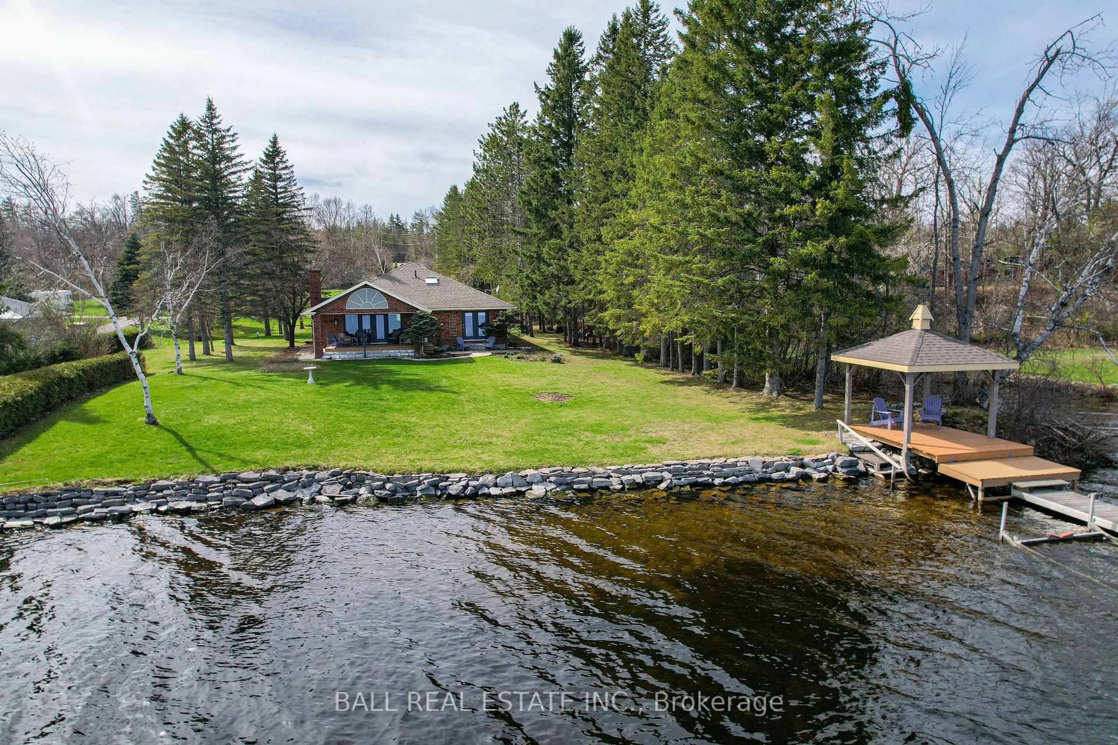 A pic from outside/outdoor area/front of a property/back of a property/a pic from drone, water/lake/river/ocean view for 13 Fire Route 123 N/A, Trent Lakes Ontario K0M 1A0