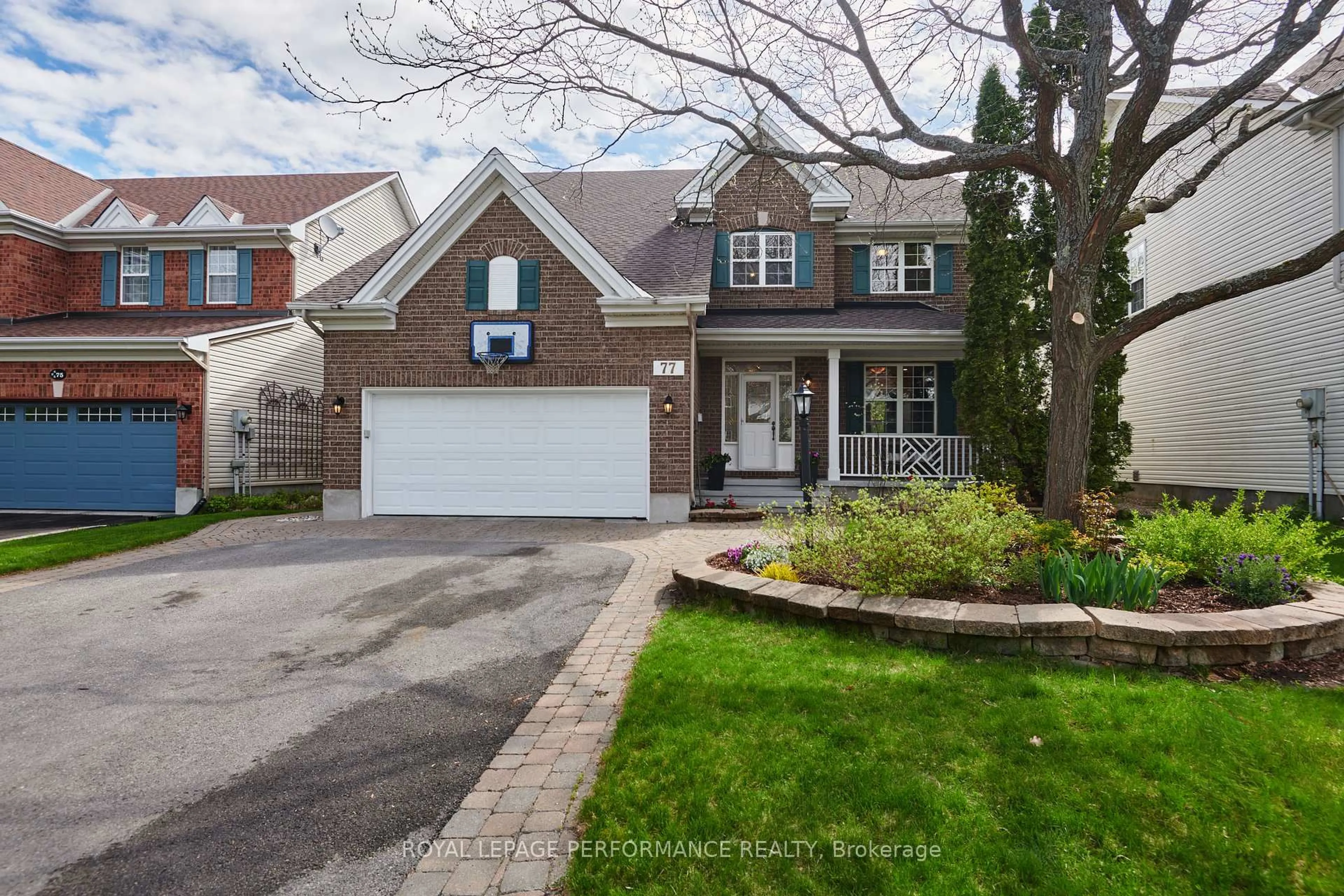 Home with brick exterior material, street for 77 Mattawa Cres, Ottawa Ontario K2M 2E7