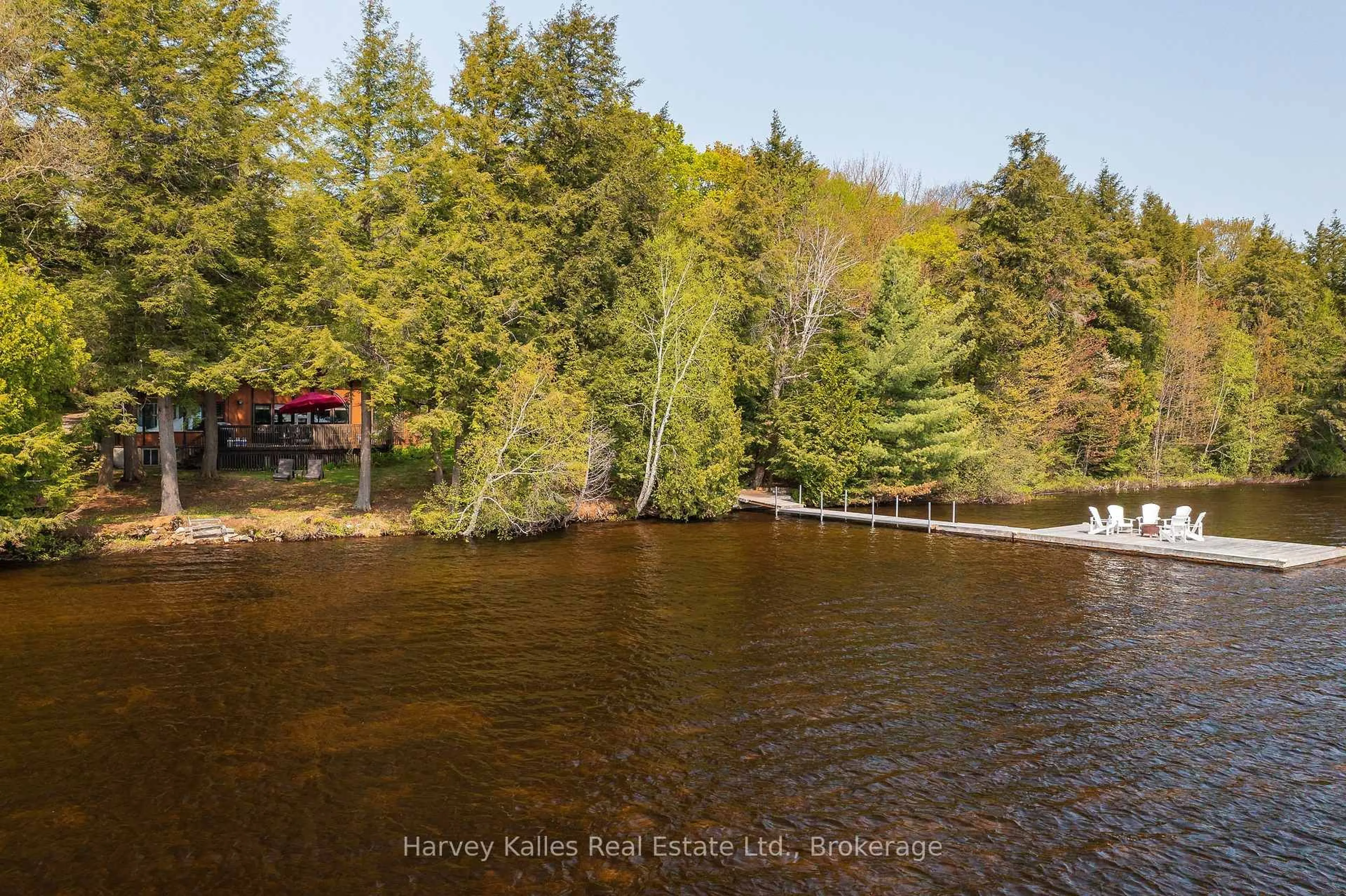 A pic from outside/outdoor area/front of a property/back of a property/a pic from drone, water/lake/river/ocean view for 1033 Scott Lane, Lake of Bays Ontario P1H 2J6