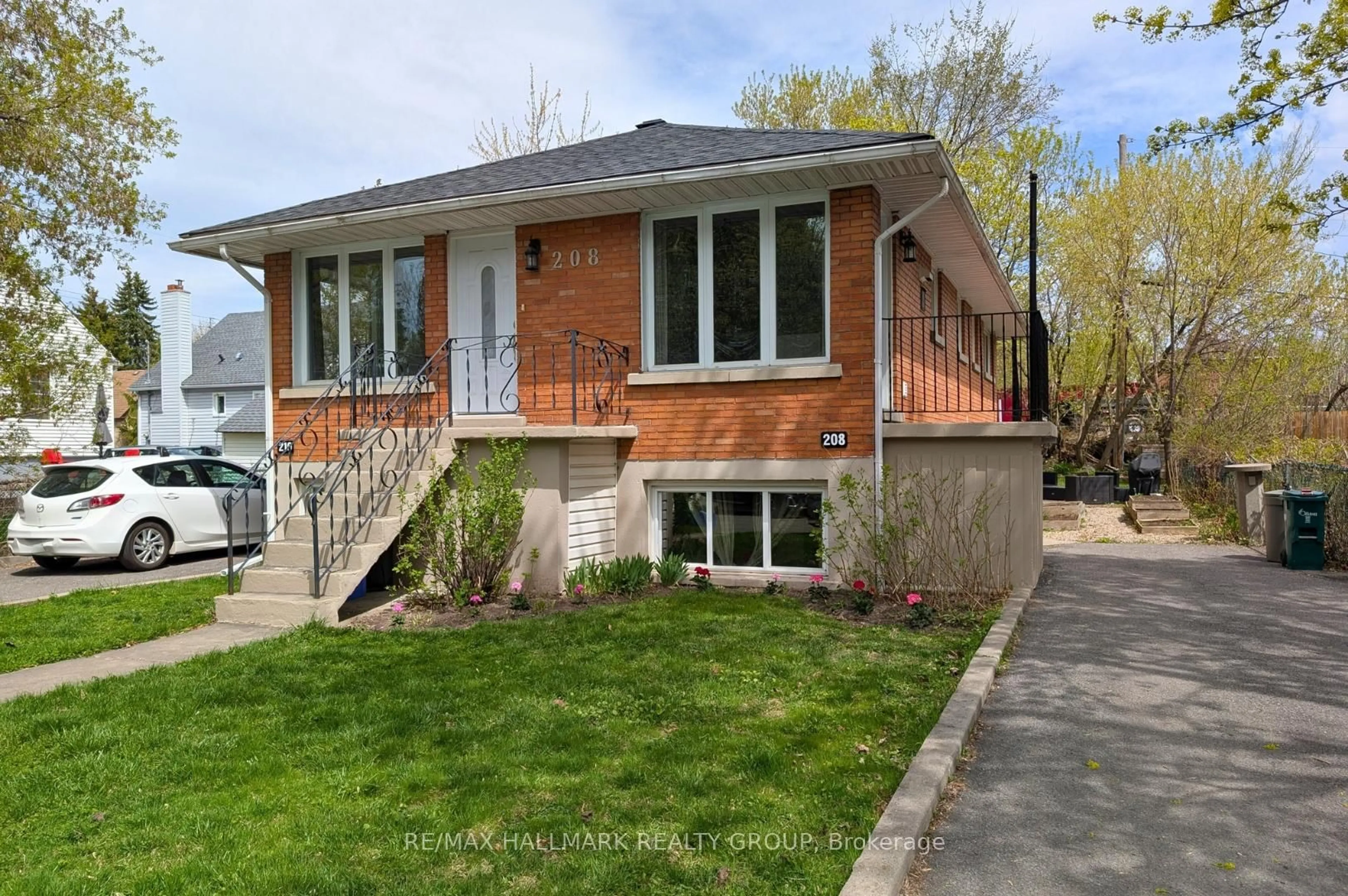 Home with brick exterior material, street for 208 - 210 Renouf Ave, Ottawa Ontario K1K 3T1