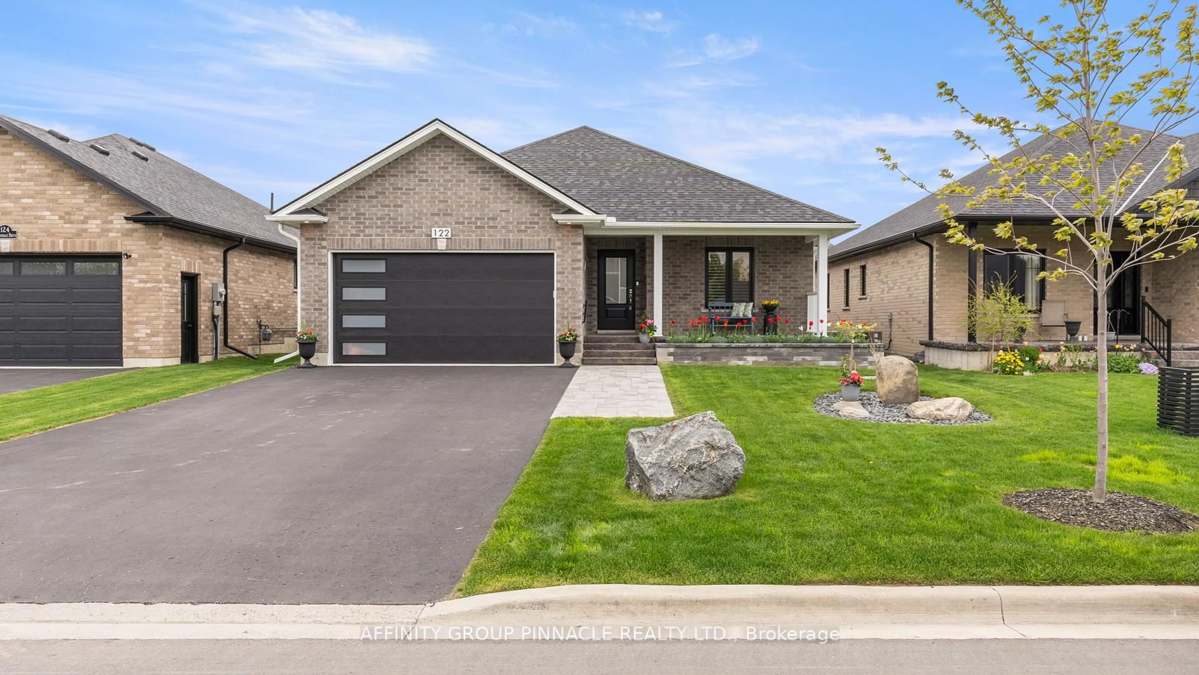 Home with brick exterior material, street for 122 Springdale Dr, Kawartha Lakes Ontario K9V 0J3