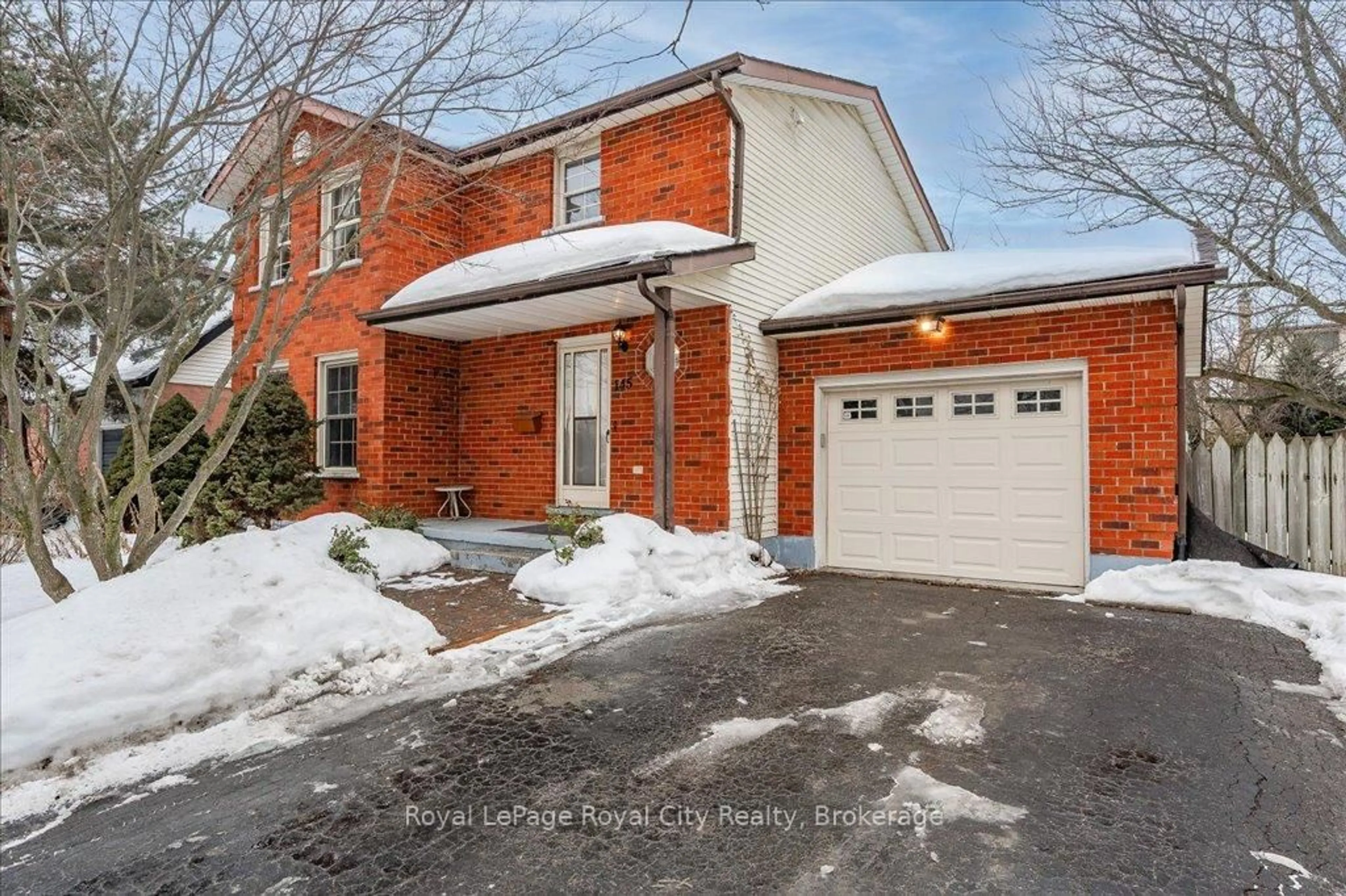 Home with brick exterior material, street for 145 Kortright Rd, Guelph Ontario N1G 3N9