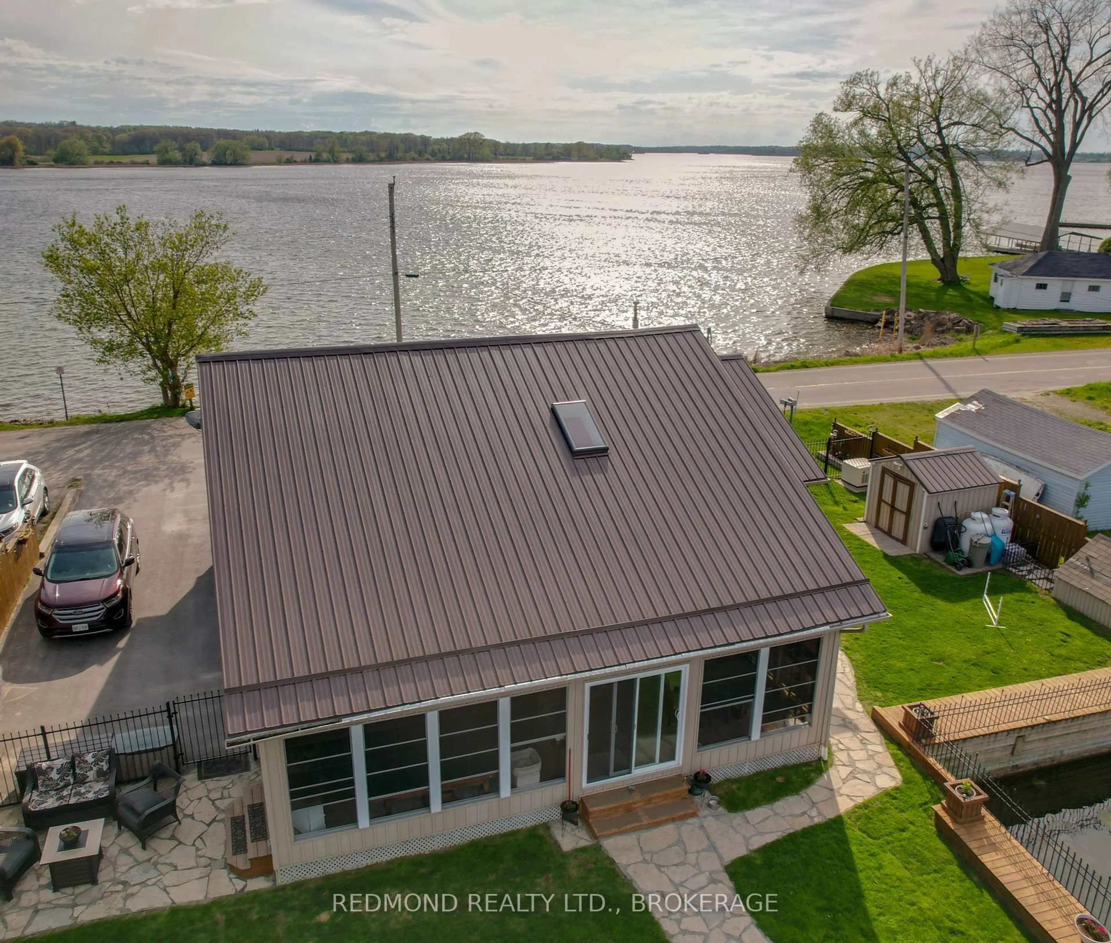 A pic from outside/outdoor area/front of a property/back of a property/a pic from drone, water/lake/river/ocean view for 356 HOWE ISLAND FERRY Rd, Gananoque Ontario K7G 2V5