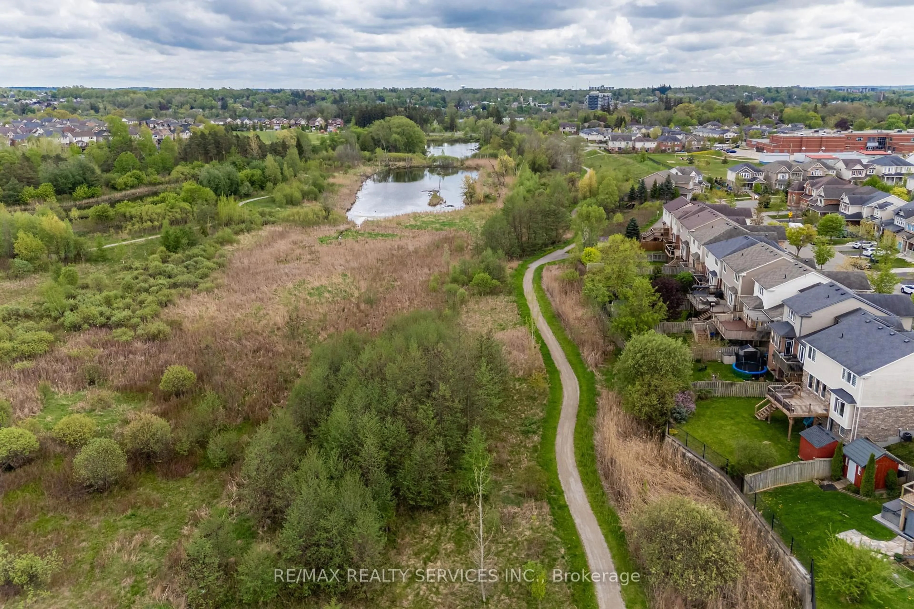 A pic from outside/outdoor area/front of a property/back of a property/a pic from drone, water/lake/river/ocean view for 112 Fletcher Circ, Cambridge Ontario N3C 0B6