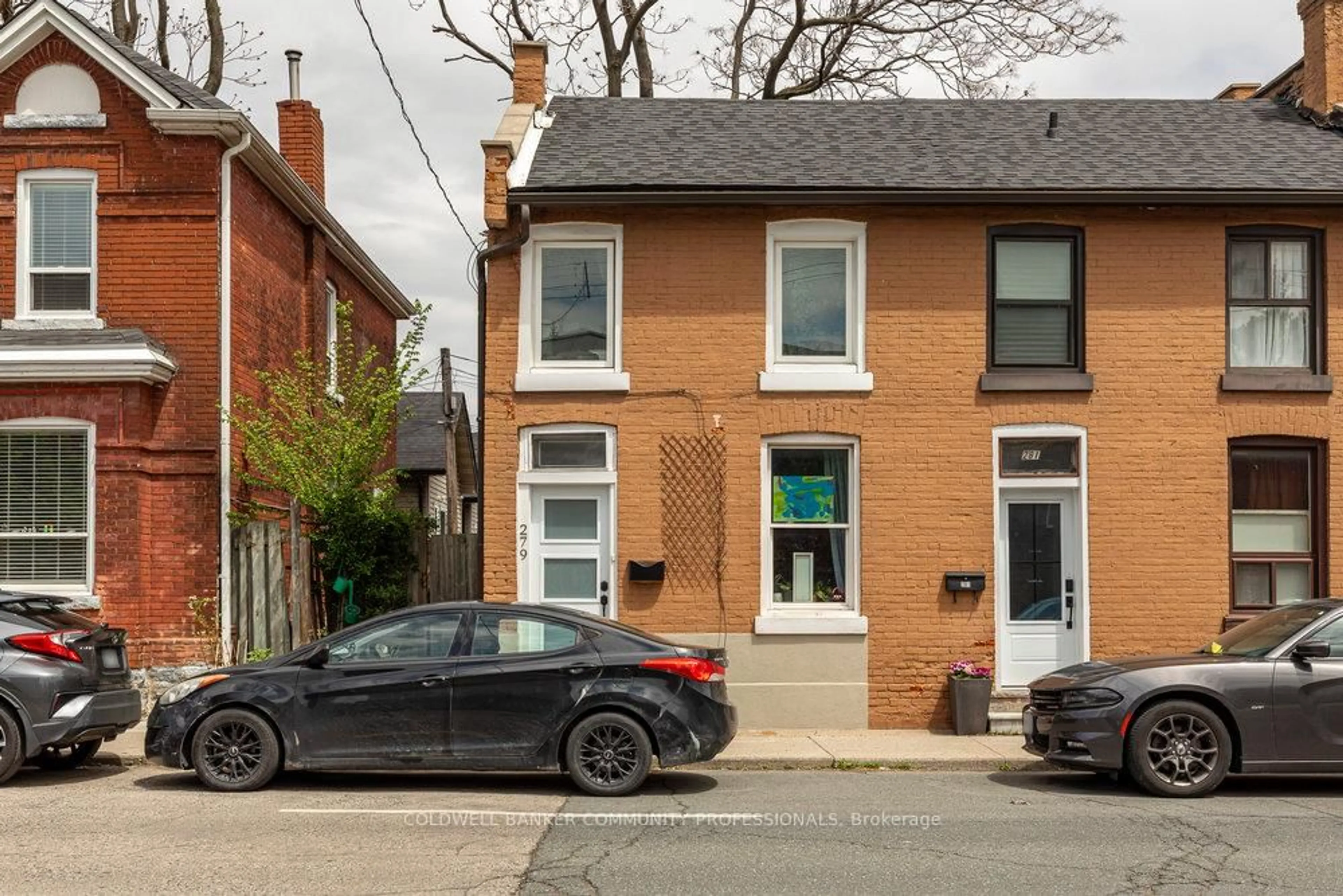 Home with brick exterior material, street for 279 Wilson St, Hamilton Ontario L8L 1S2