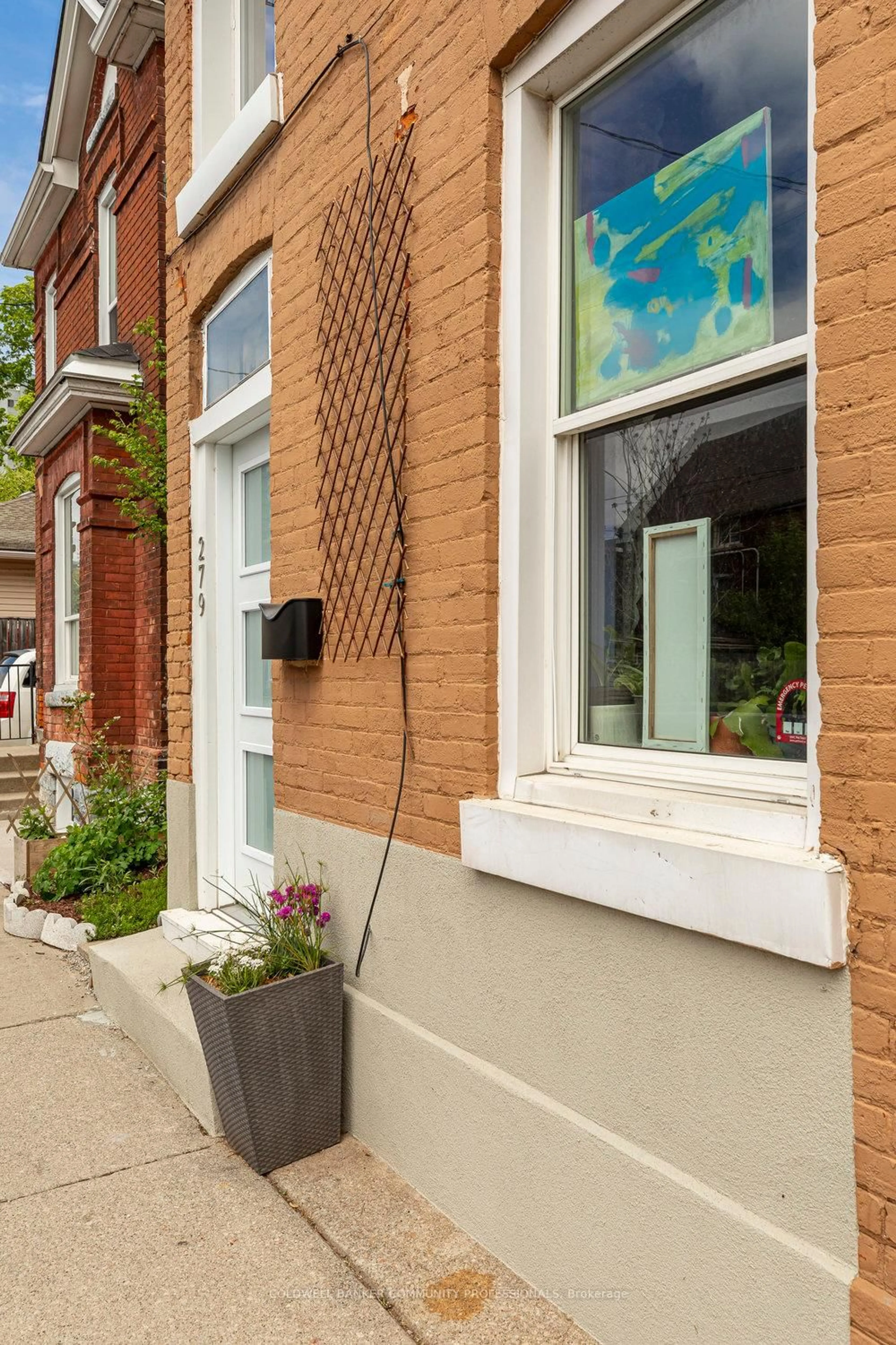 Home with brick exterior material, street for 279 Wilson St, Hamilton Ontario L8L 1S2