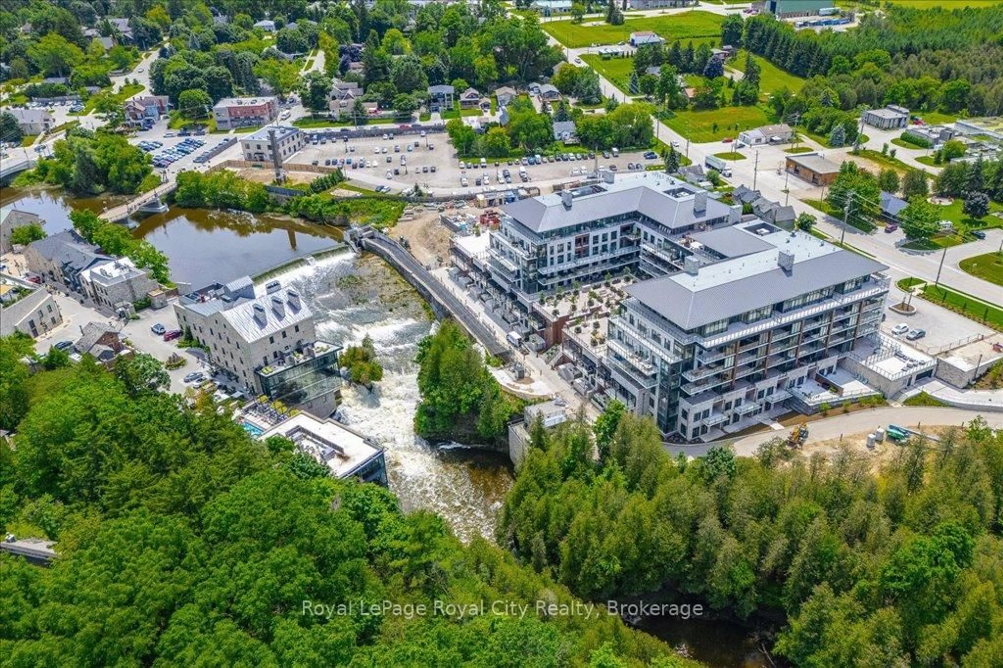 A pic from outside/outdoor area/front of a property/back of a property/a pic from drone, building for 6523 Wellington 7 Rd #110, Centre Wellington Ontario N0B 1S0
