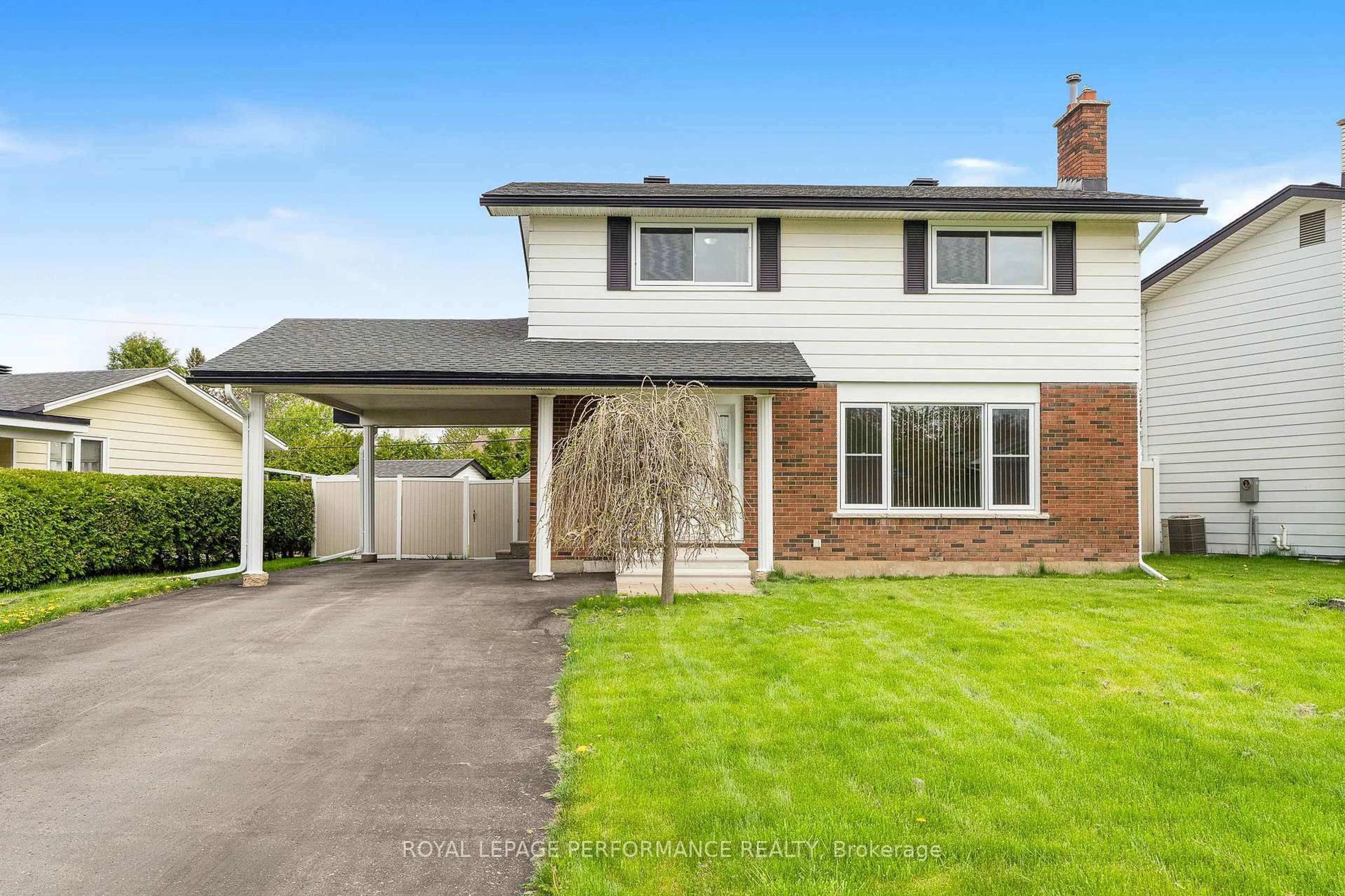 Home with vinyl exterior material, street for 1407 Duford Dr, Orleans Ontario K1E 1E4