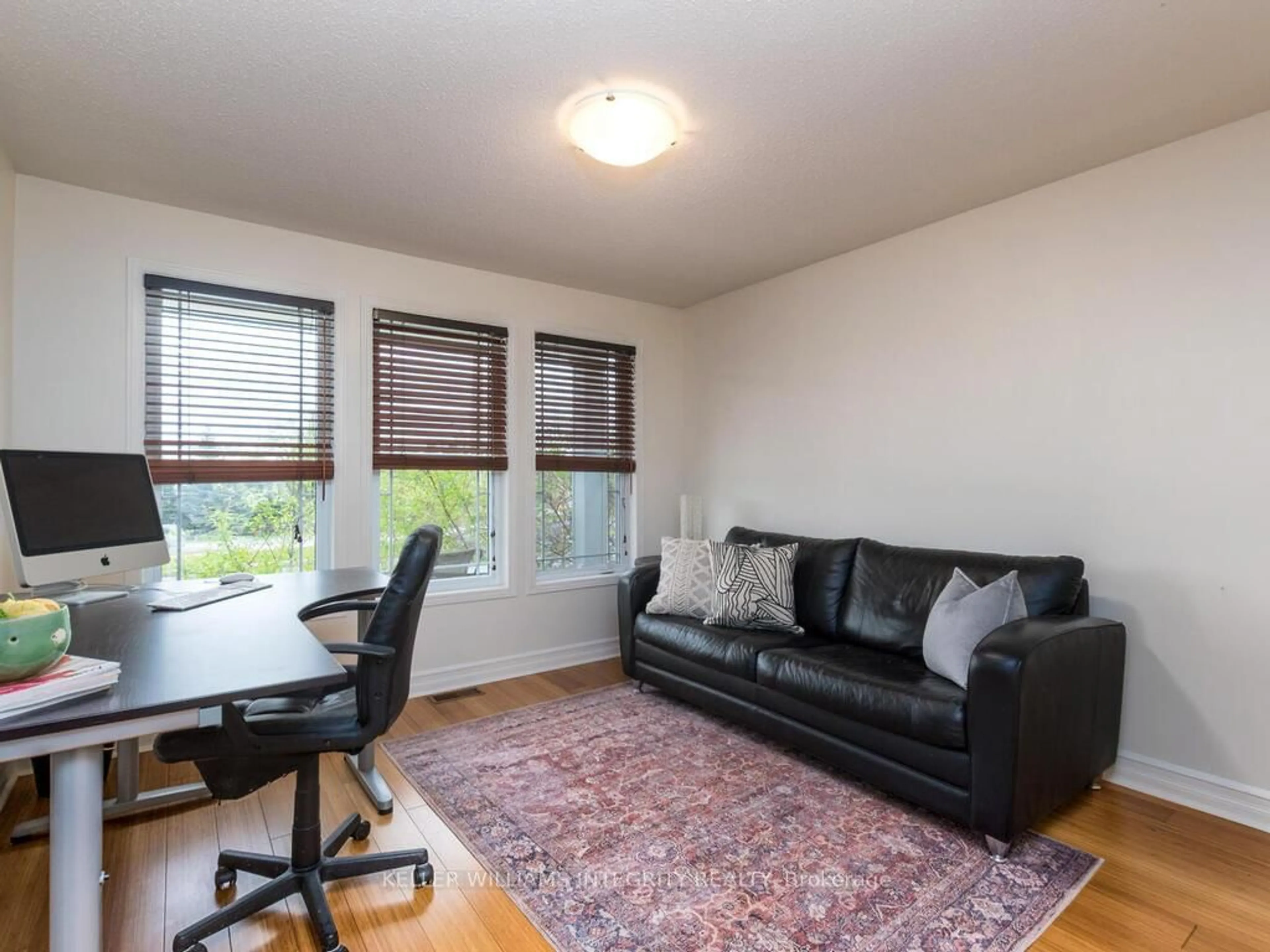 Living room with furniture, wood/laminate floor for 223 Willow Creek Circ, Ottawa Ontario K2G 7B1