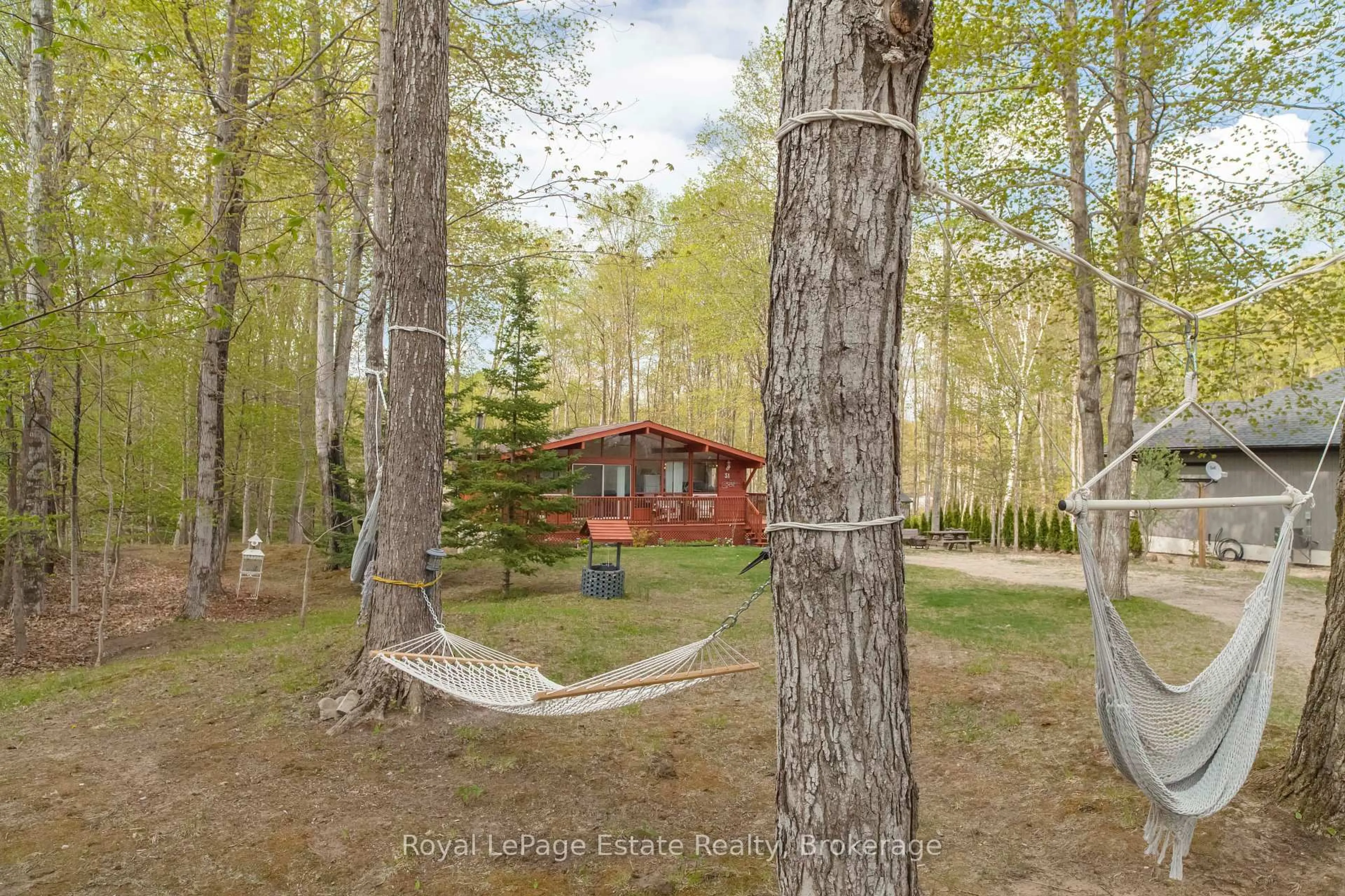 A pic from outside/outdoor area/front of a property/back of a property/a pic from drone, forest/trees view for 31 Deer Trail Rd, South Bruce Peninsula Ontario N0H 2G0