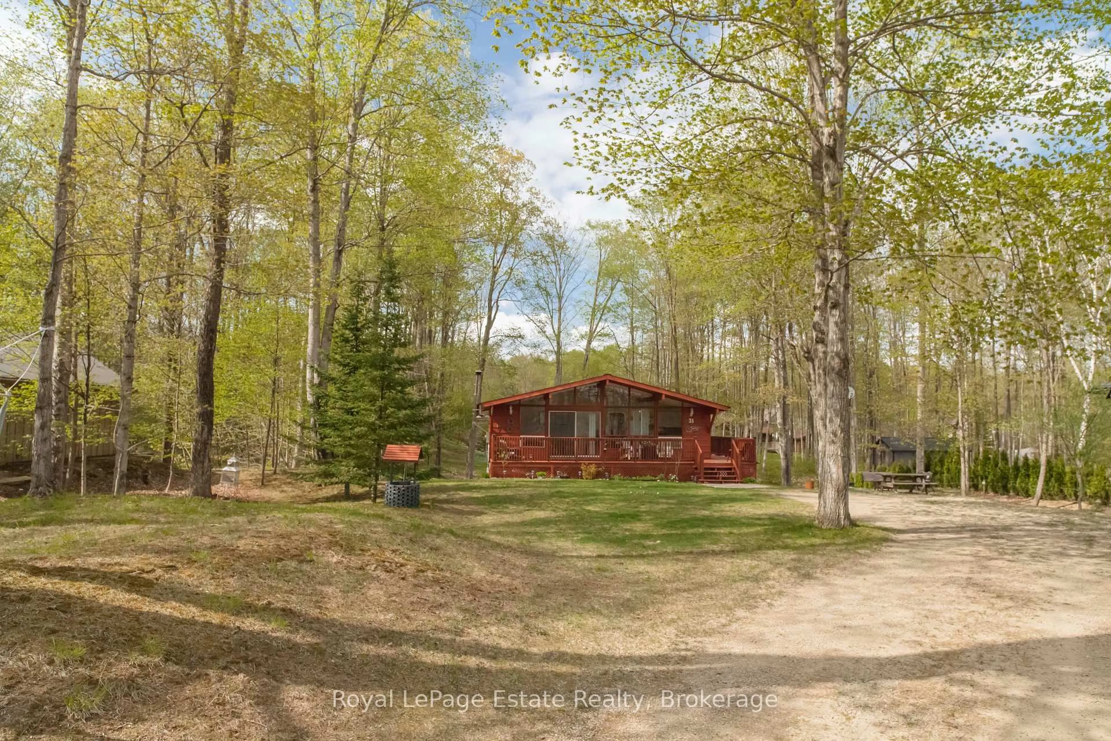 A pic from outside/outdoor area/front of a property/back of a property/a pic from drone, forest/trees view for 31 Deer Trail Rd, South Bruce Peninsula Ontario N0H 2G0