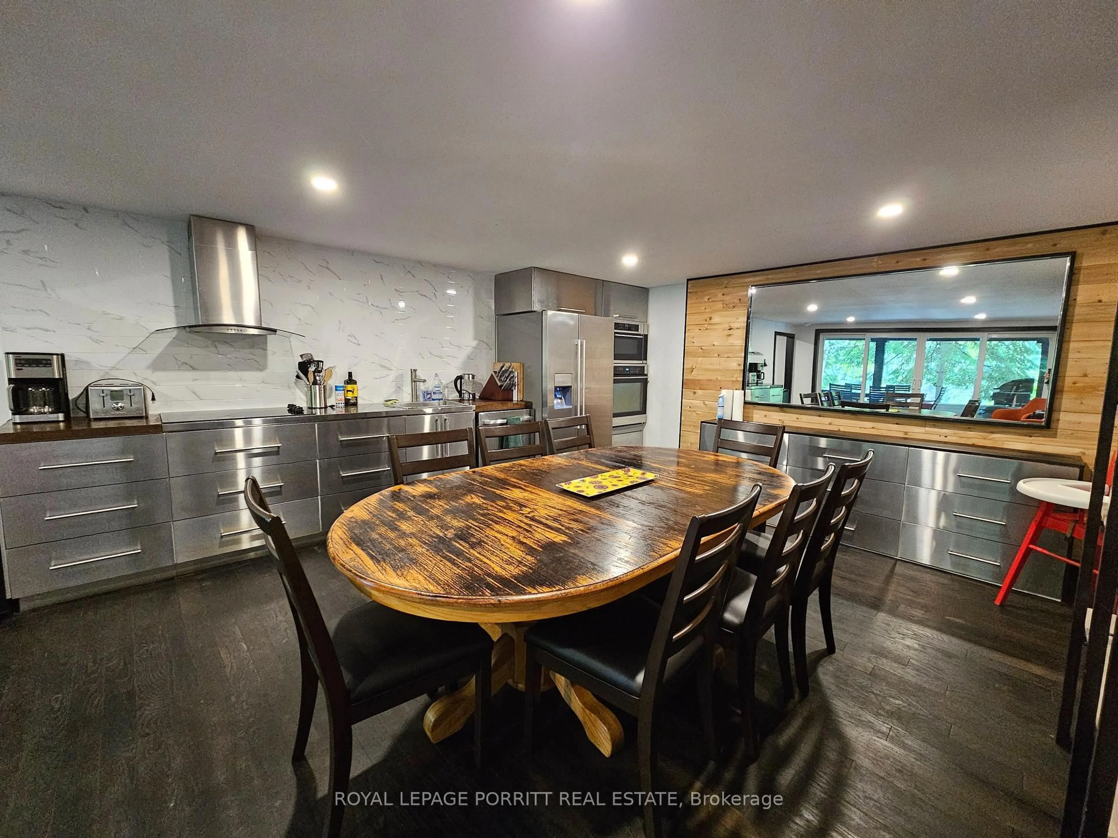 Open concept kitchen, wood/laminate floor for 1015 Bayview Point Rd, Lake of Bays Ontario P0A 1H0