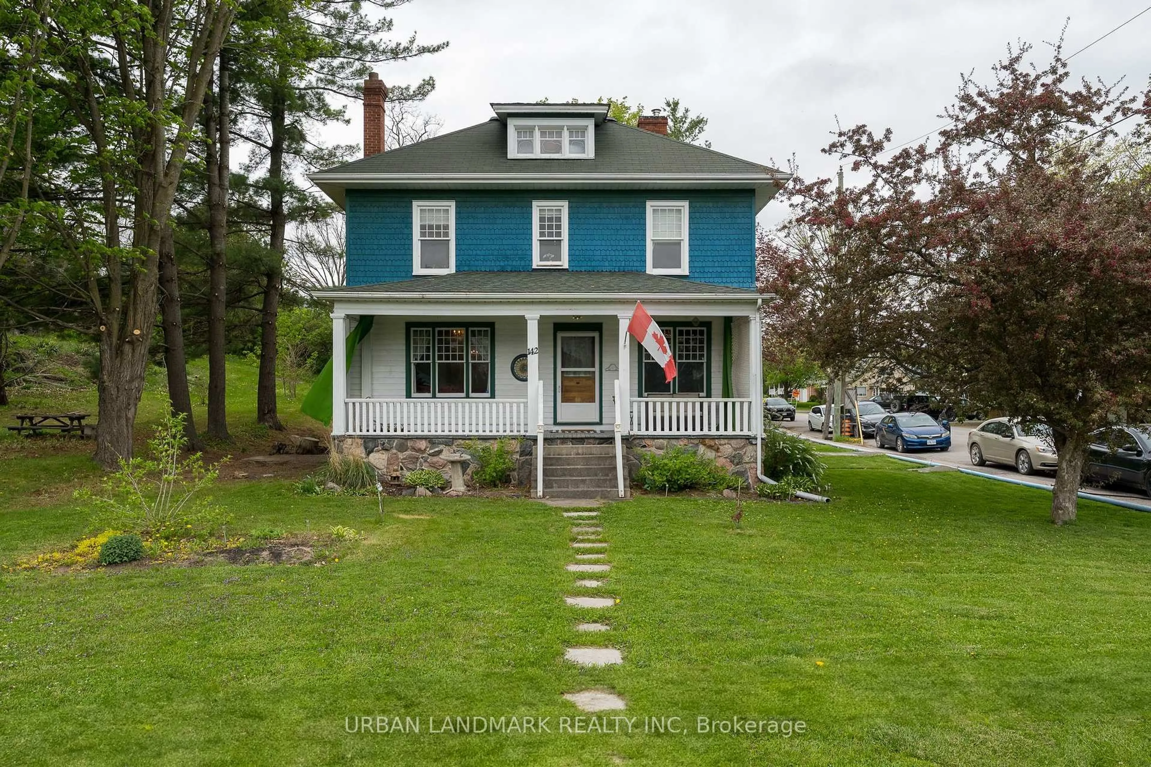 Home with vinyl exterior material, street for 142 St Lawrence St, Madoc Ontario K0K 2K0