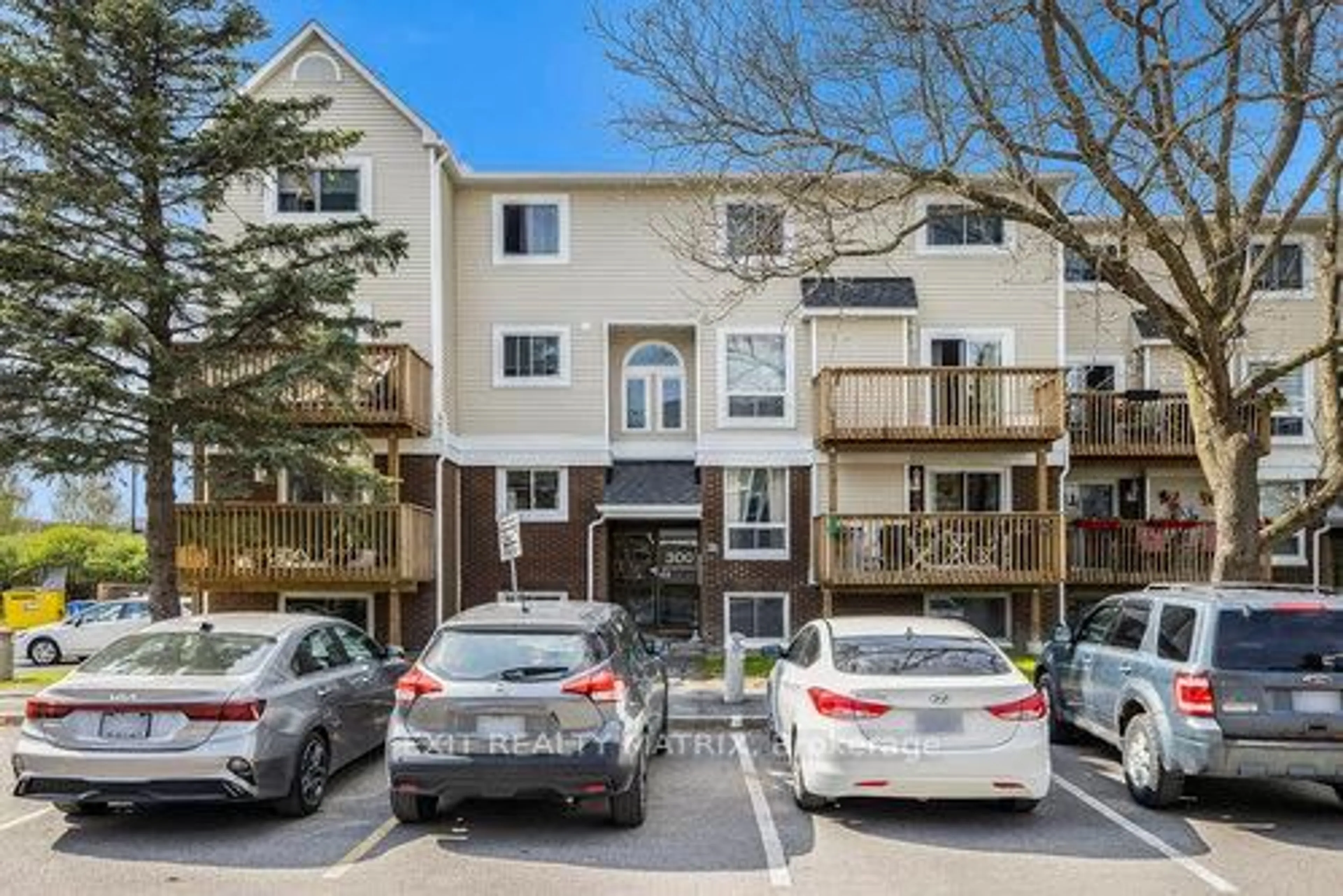 A pic from outside/outdoor area/front of a property/back of a property/a pic from drone, street for 300 Fenerty Crt #4, Ottawa Ontario K2L 3A8