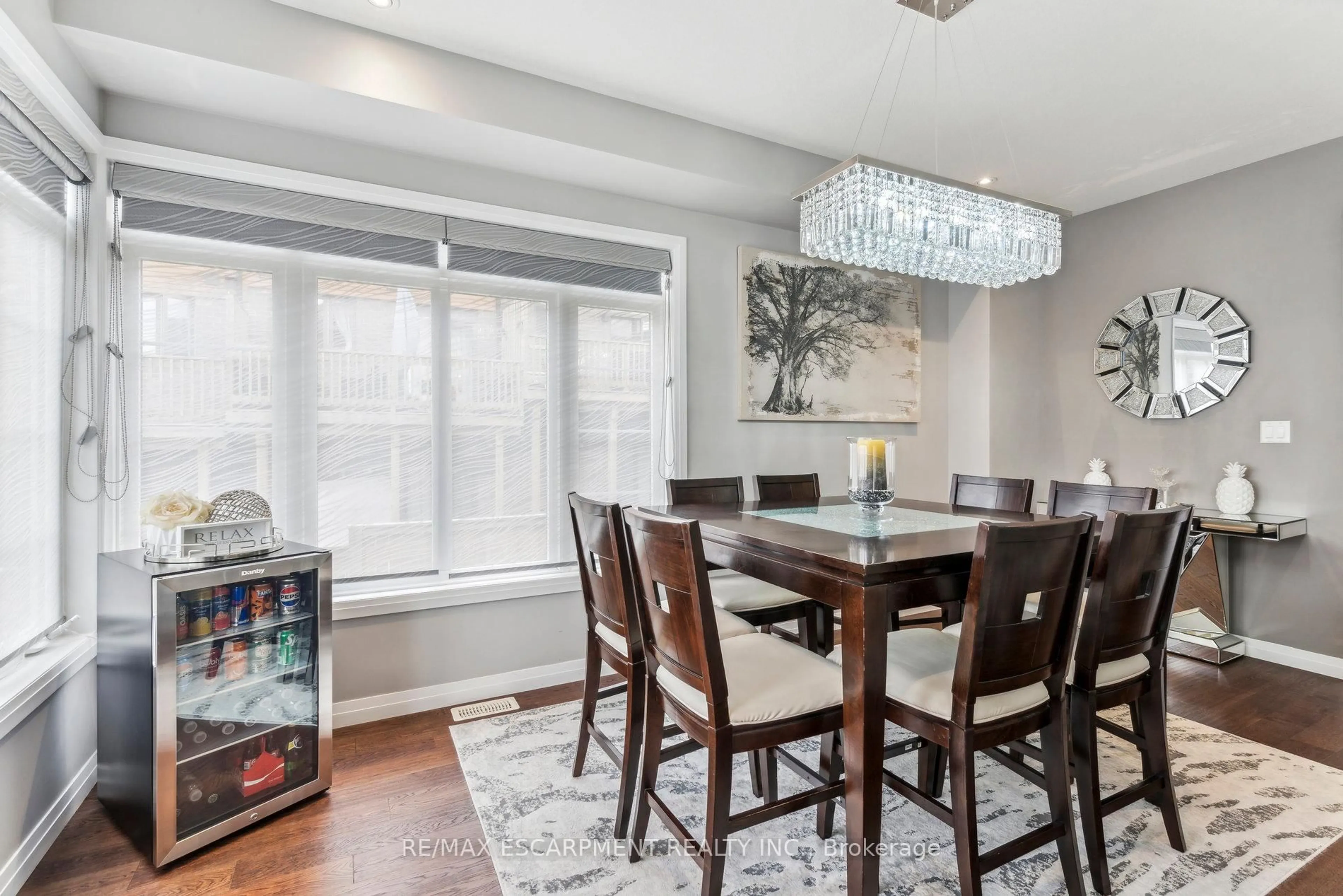 Dining room, wood/laminate floor for 30 Times Square Blvd #305, Hamilton Ontario L8J 0M1