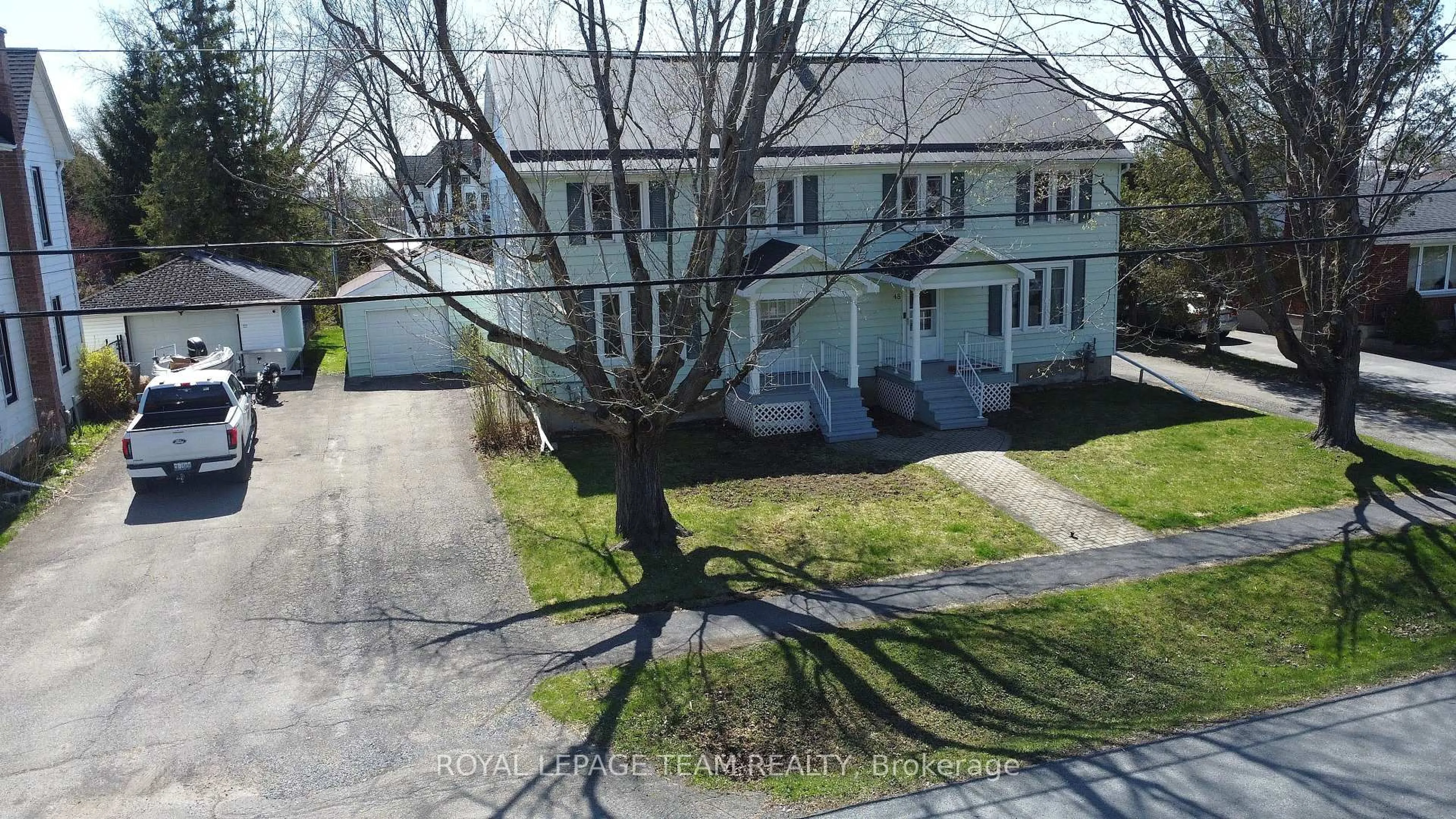 A pic from outside/outdoor area/front of a property/back of a property/a pic from drone, street for 48-50 Beach St, South Dundas Ontario K0E 1K0