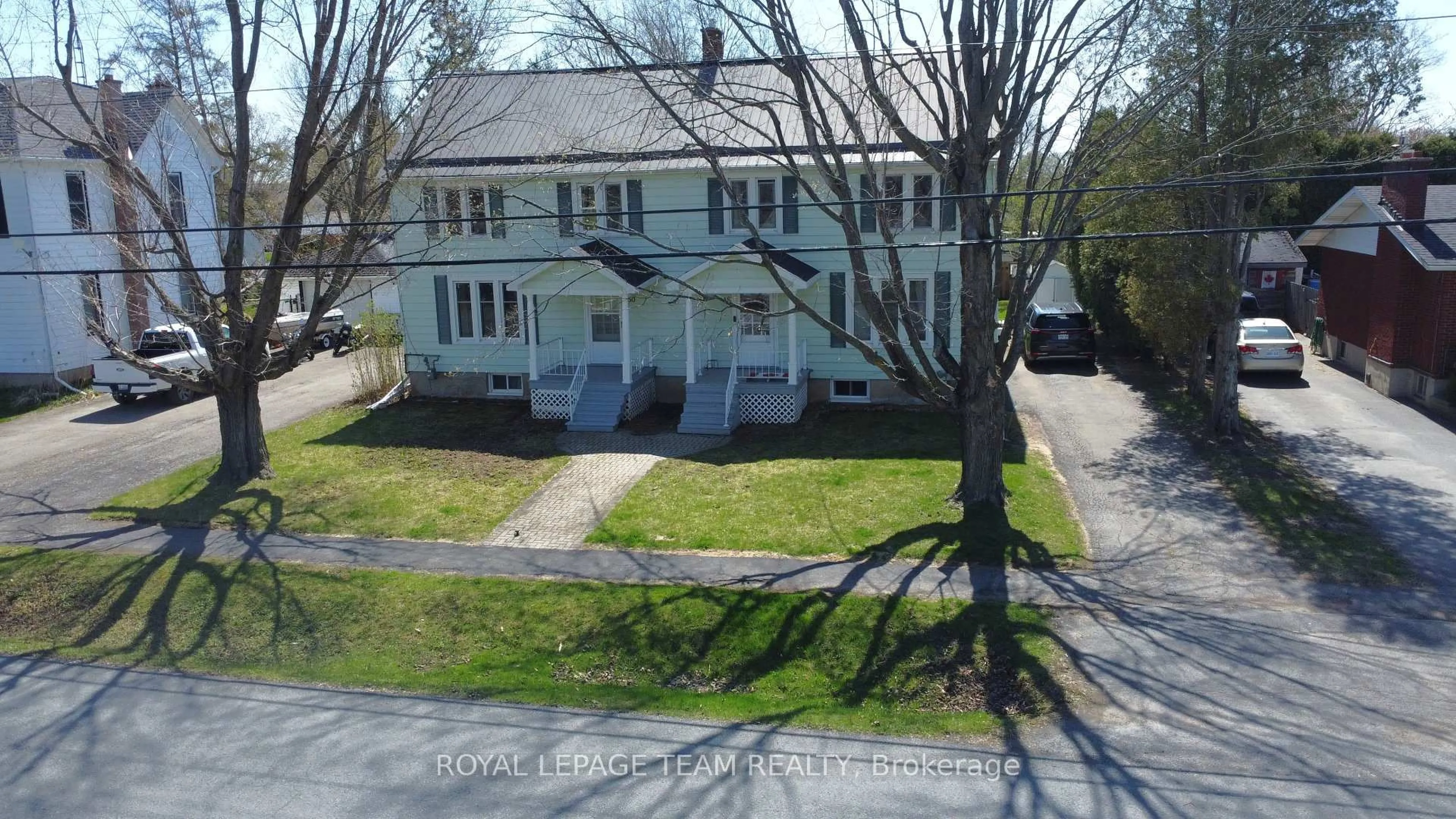 A pic from outside/outdoor area/front of a property/back of a property/a pic from drone, street for 48-50 Beach St, South Dundas Ontario K0E 1K0