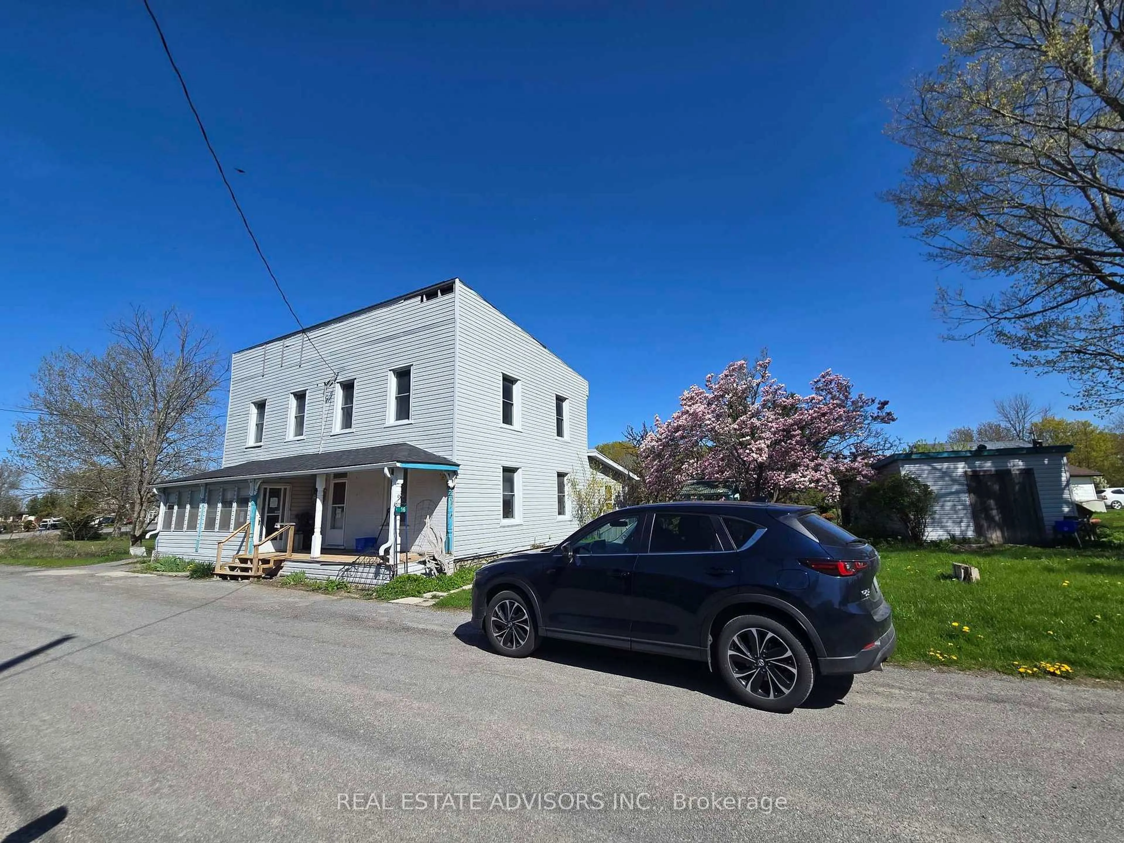 A pic from outside/outdoor area/front of a property/back of a property/a pic from drone, street for 16 Store St, Prince Edward County Ontario K0K 1T0