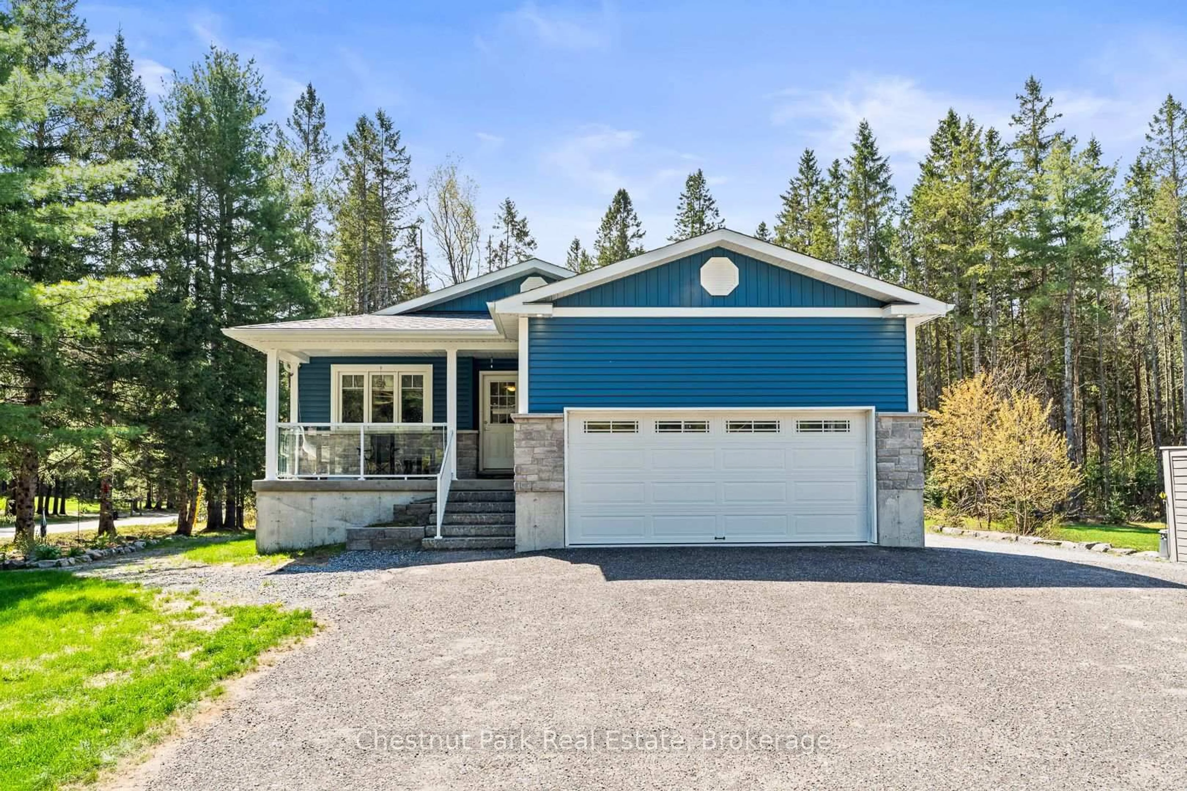 Home with vinyl exterior material, street for 583 Mary Lk Rd, Huntsville Ontario P0B 1L0