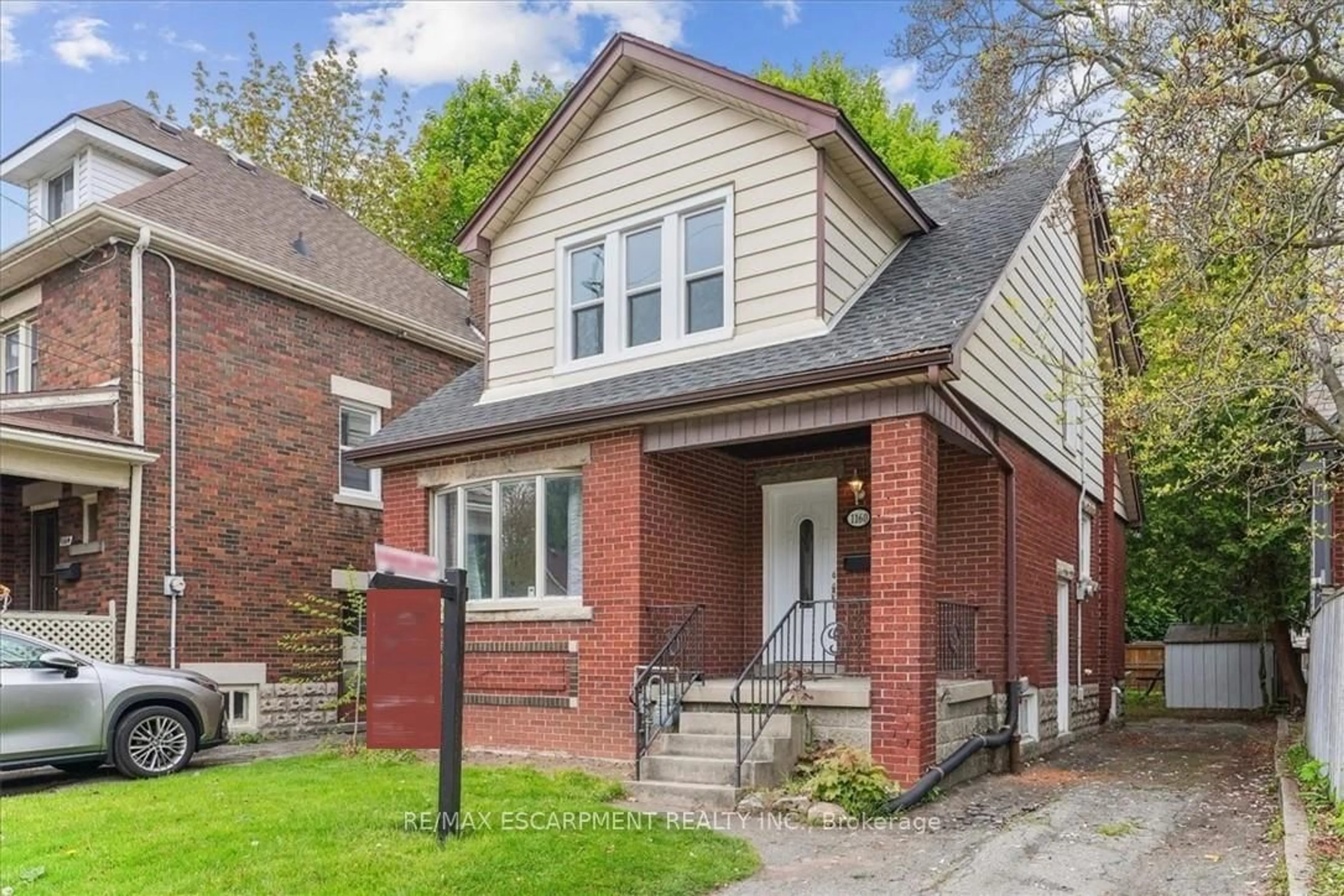 Home with brick exterior material, street for 1160 King St, Hamilton Ontario L8S 1M2