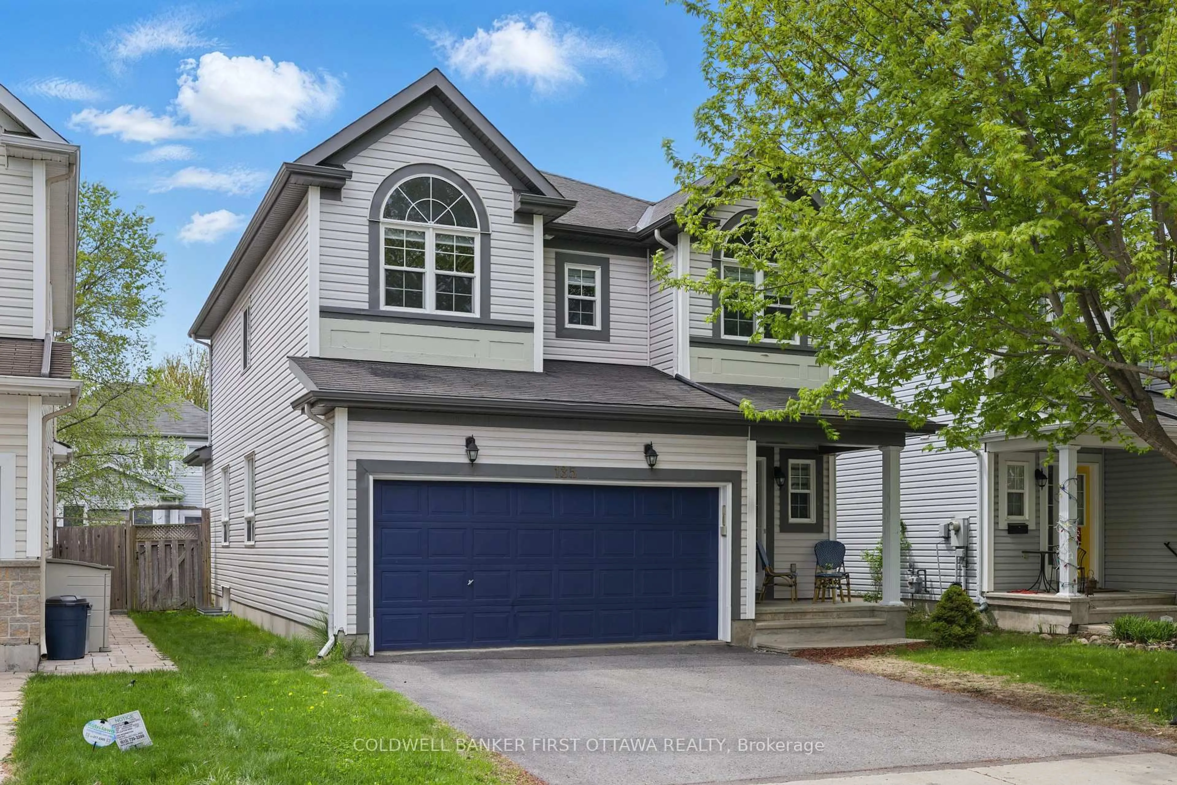 Home with vinyl exterior material, street for 135 Lamplighters Dr, Ottawa Ontario K2J 0C1