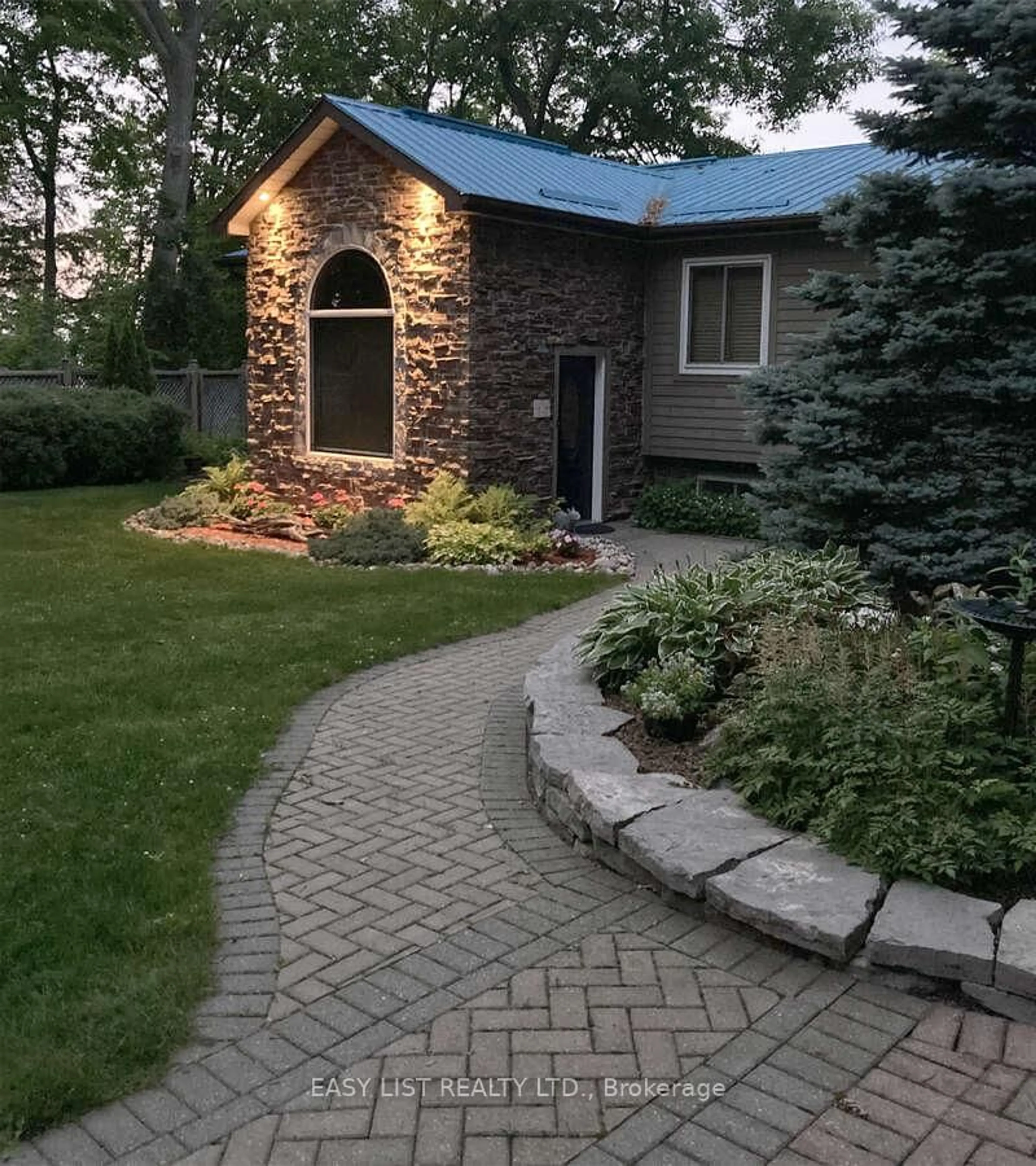 Home with brick exterior material, street for 333 Prinyers Cove Cres, Prince Edward County Ontario K0K 2T0